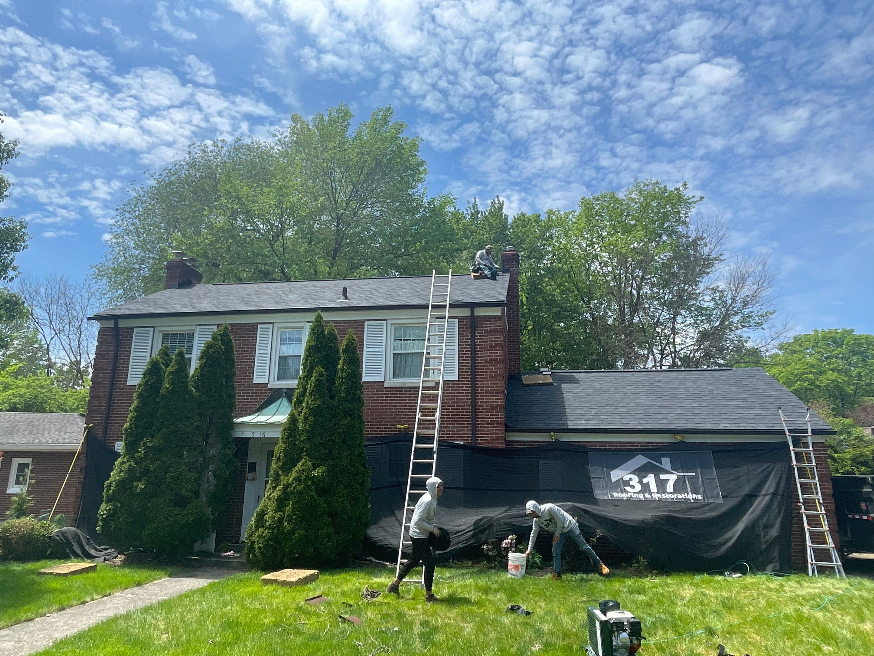 Oakridge Onyx Black and Black Gutters by 317 Roofing & Restorations