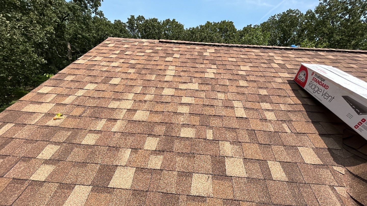 Residential Roof + Gutters & Downspouts & Gutter Guards  by Titan Commercial & Residential Roofing 