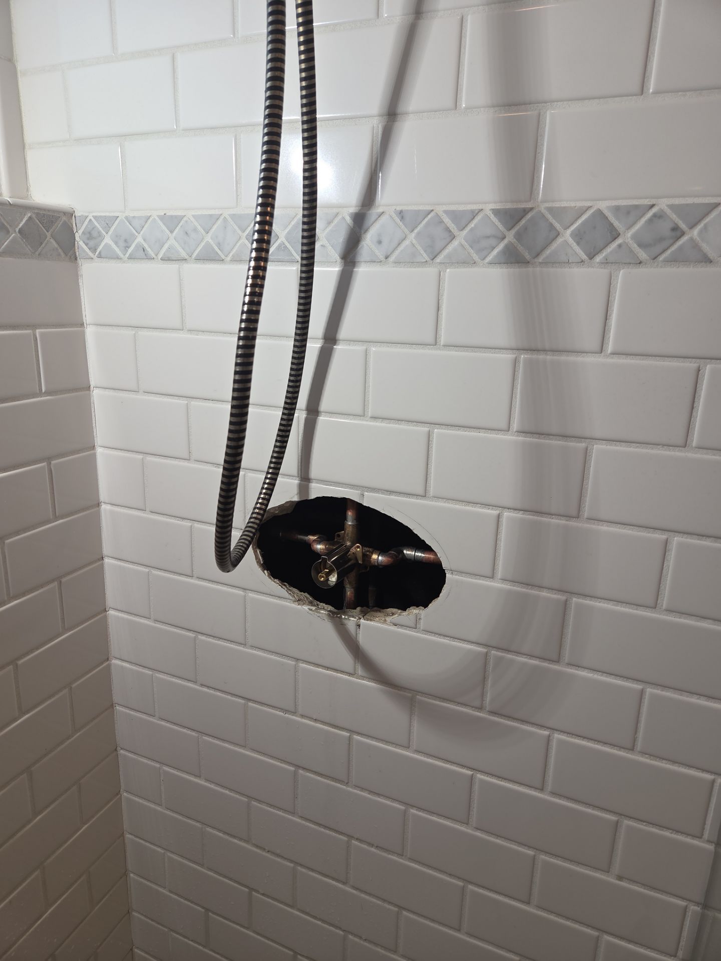 Replacing shower Valve through Tile by Professional Plumbing Inc 
