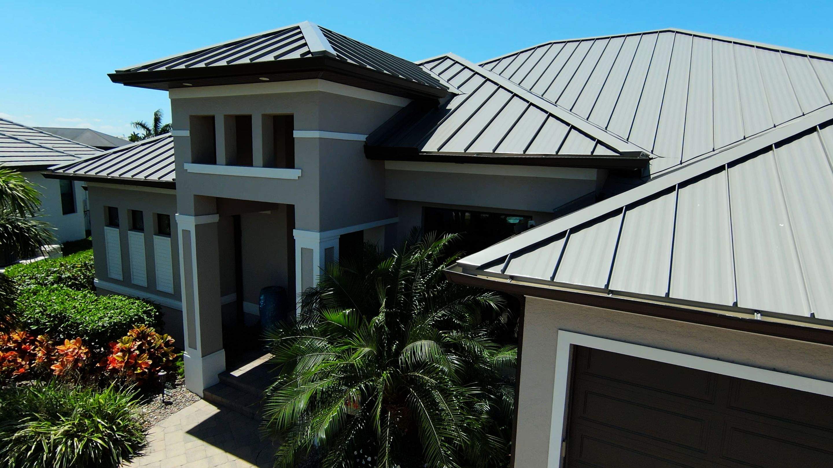 Residential Roofing Installation using Gulf Coast Metals Gulf Seam Panels by Four Peaks Roofing