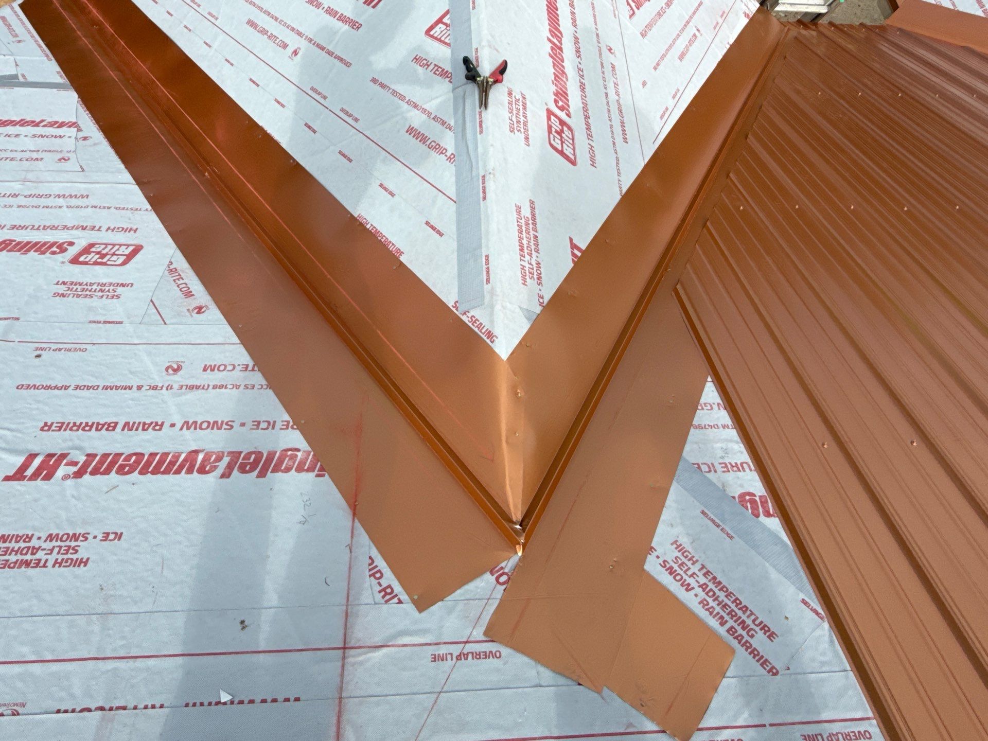 Copper Metallic 26-gauge low rib metal roofing. by In & Out Construction & Remodeling, LLC