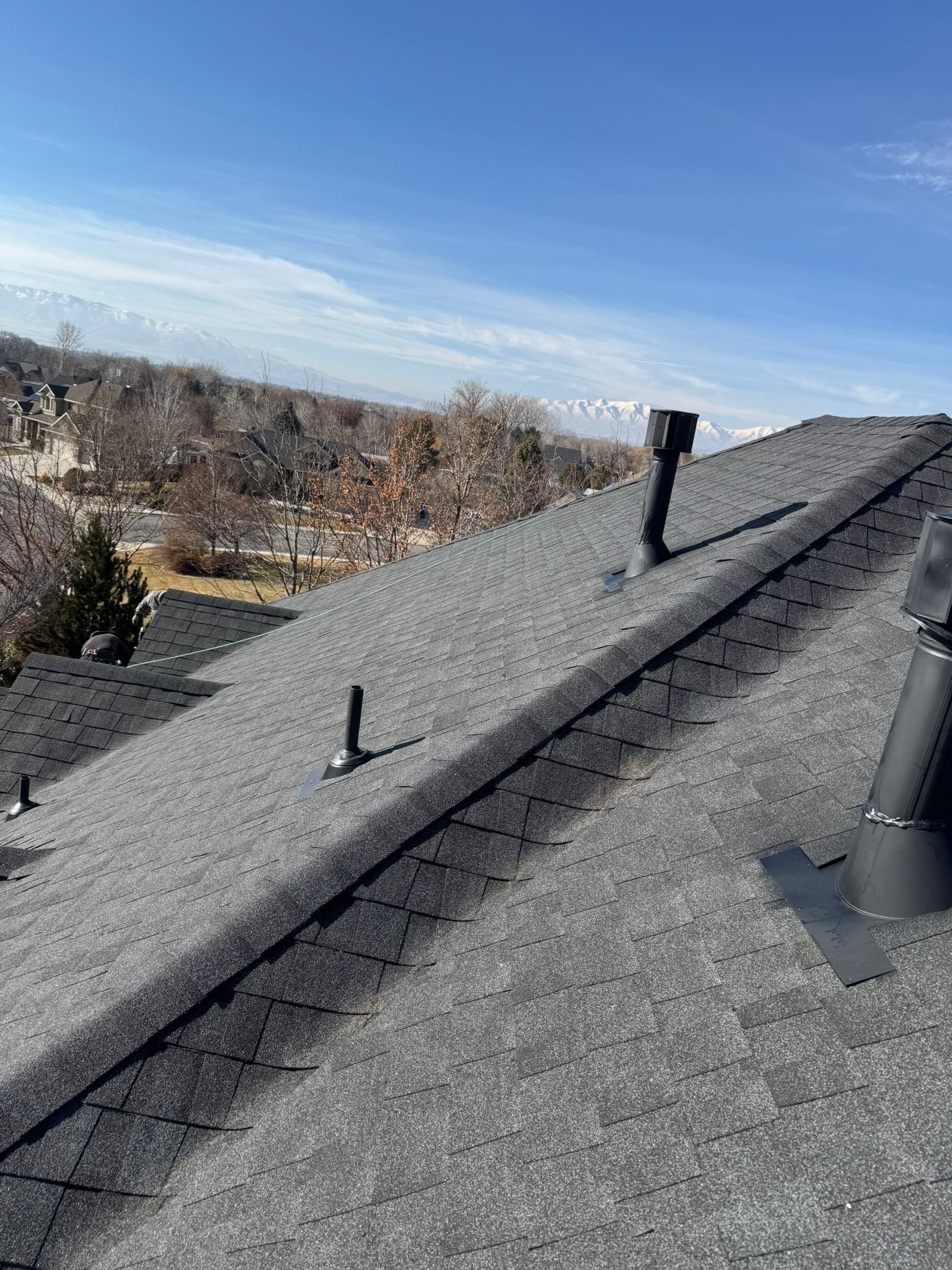 Charcoal Gray Shingles by Reimagine Roofing