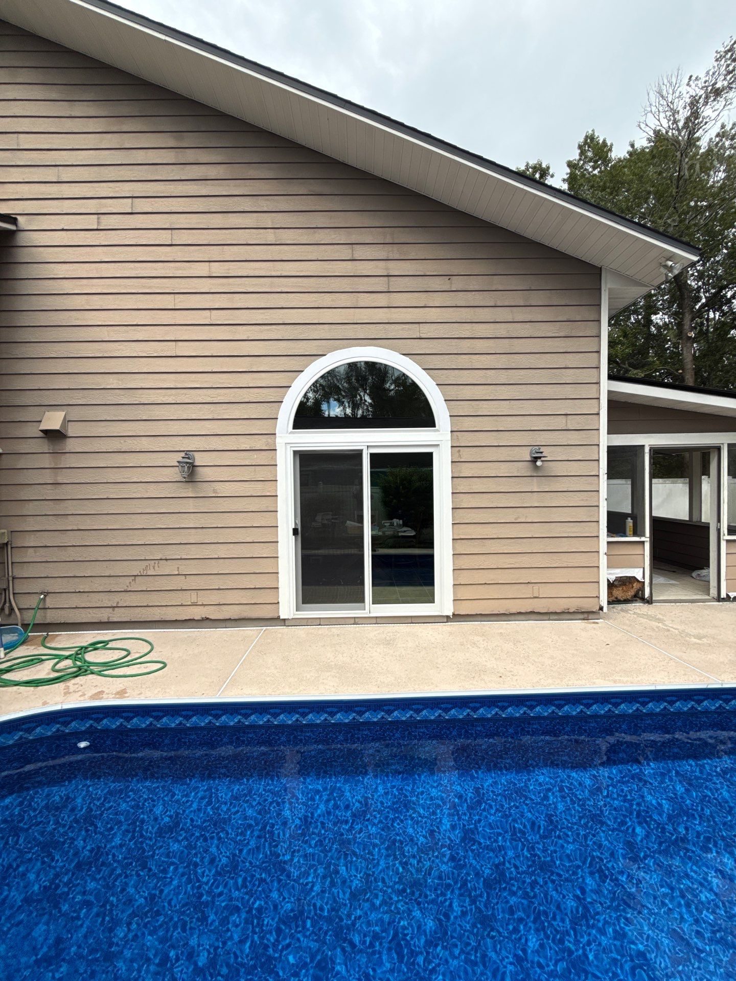 Custom Arched Transom and Sliding Patio Door Replacement in Gainesville by Windows & Doors Store