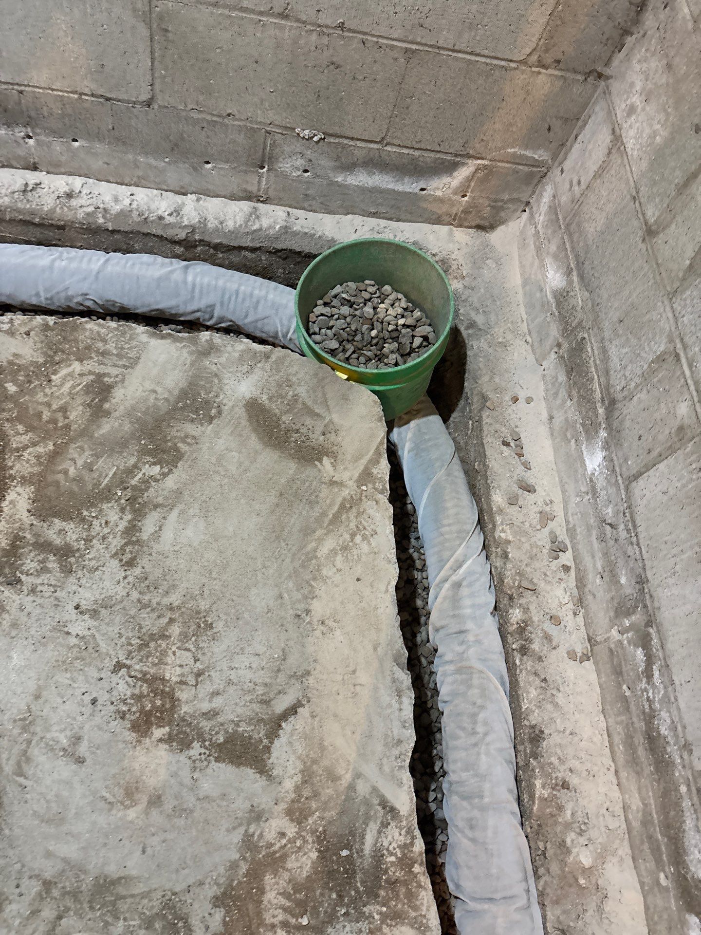 Interior Drain Tile & Buried Discharge in South Minneapolis by Waterproofing Northeast