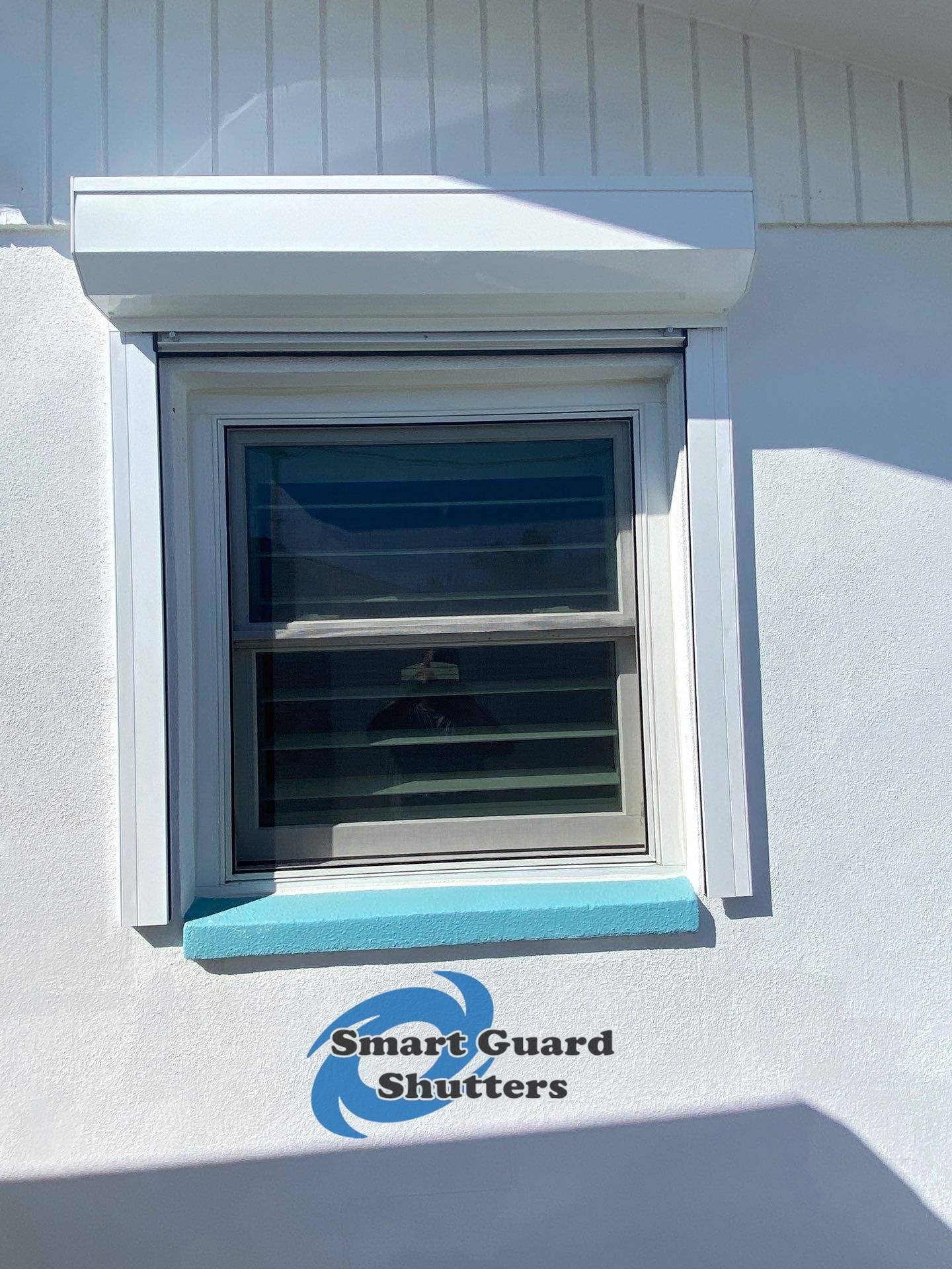 Rolling Shutters in White by Smart Guard Shutters