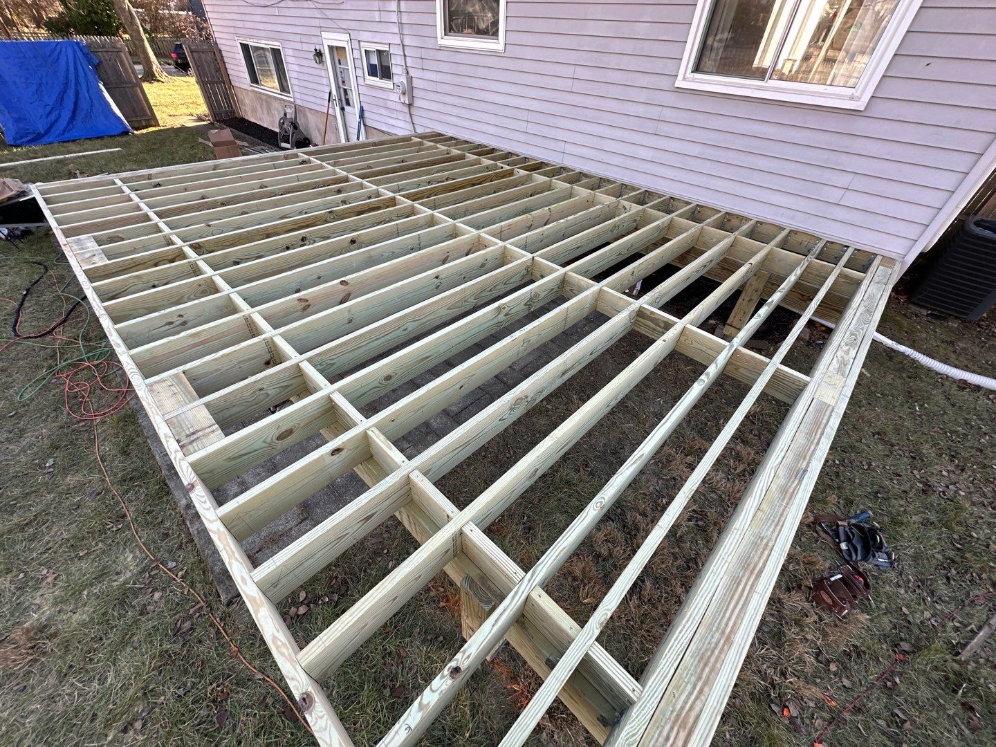 New deck construction and replacement of window with new sliding door  by deck guardian