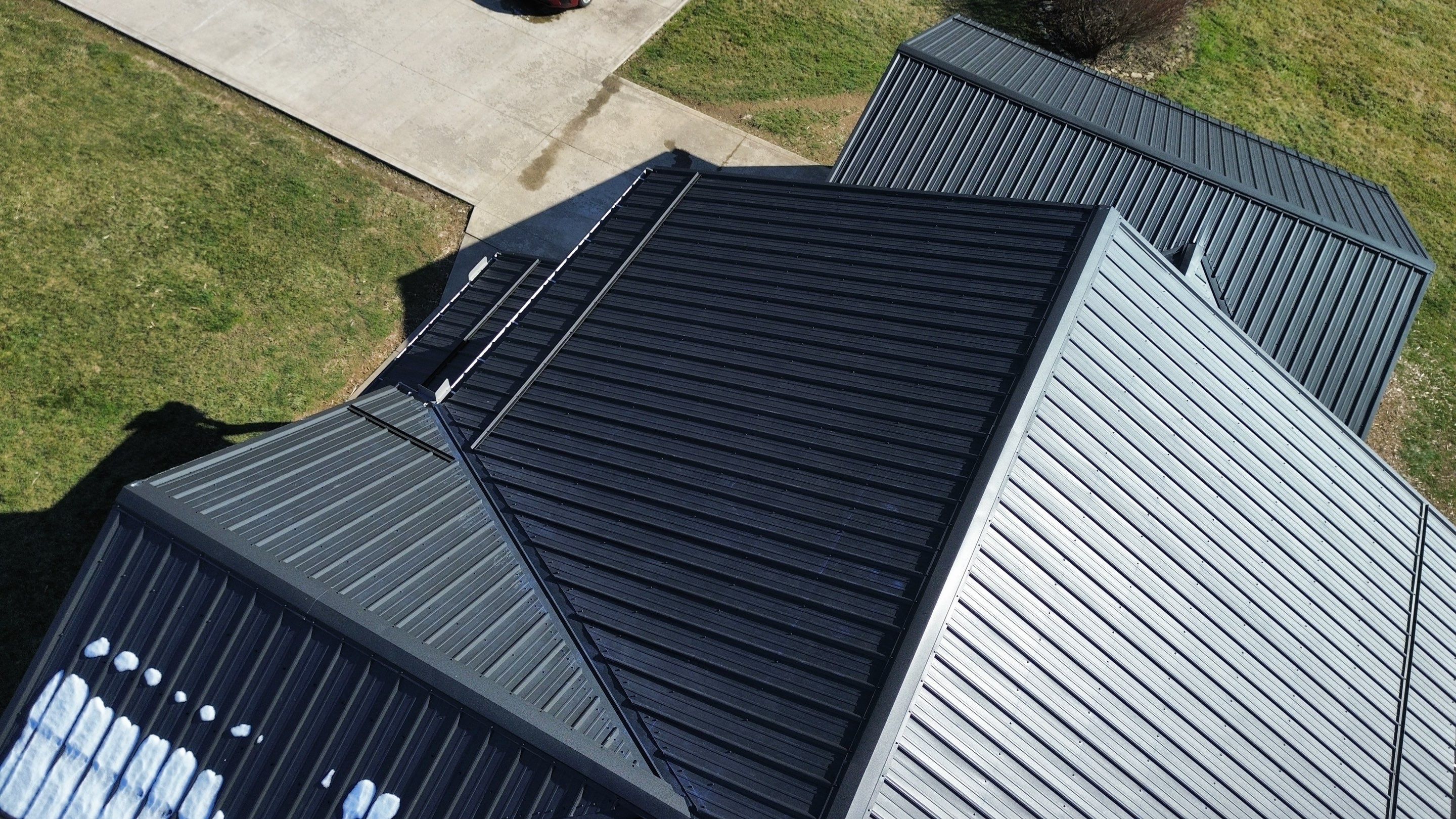 Residential Roofing Installation using Performance Panel Metal - Frost Black by RoofX 