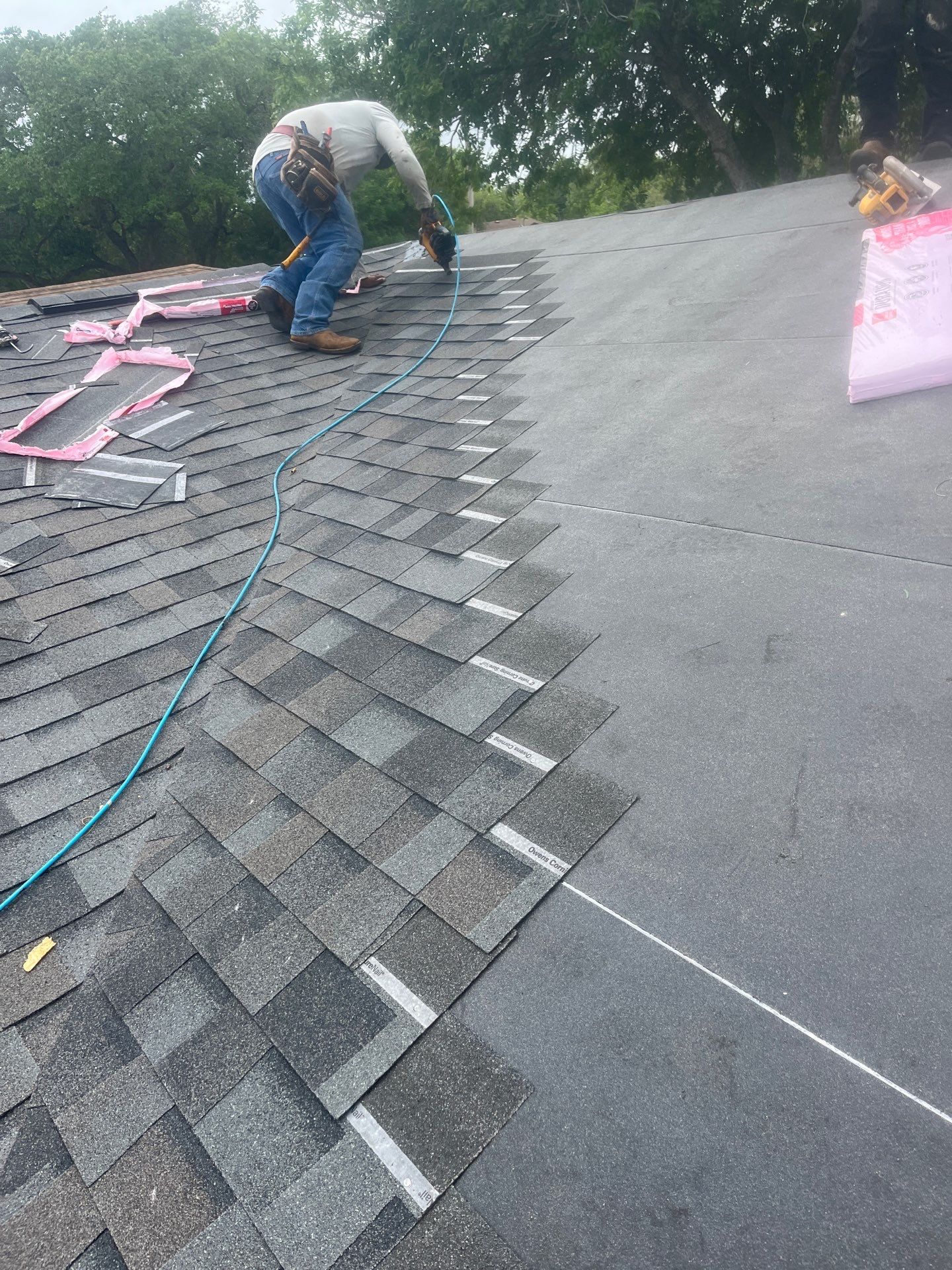 Colored Vinyl Windows to blend into brick by Bayfront Roofing and Construction