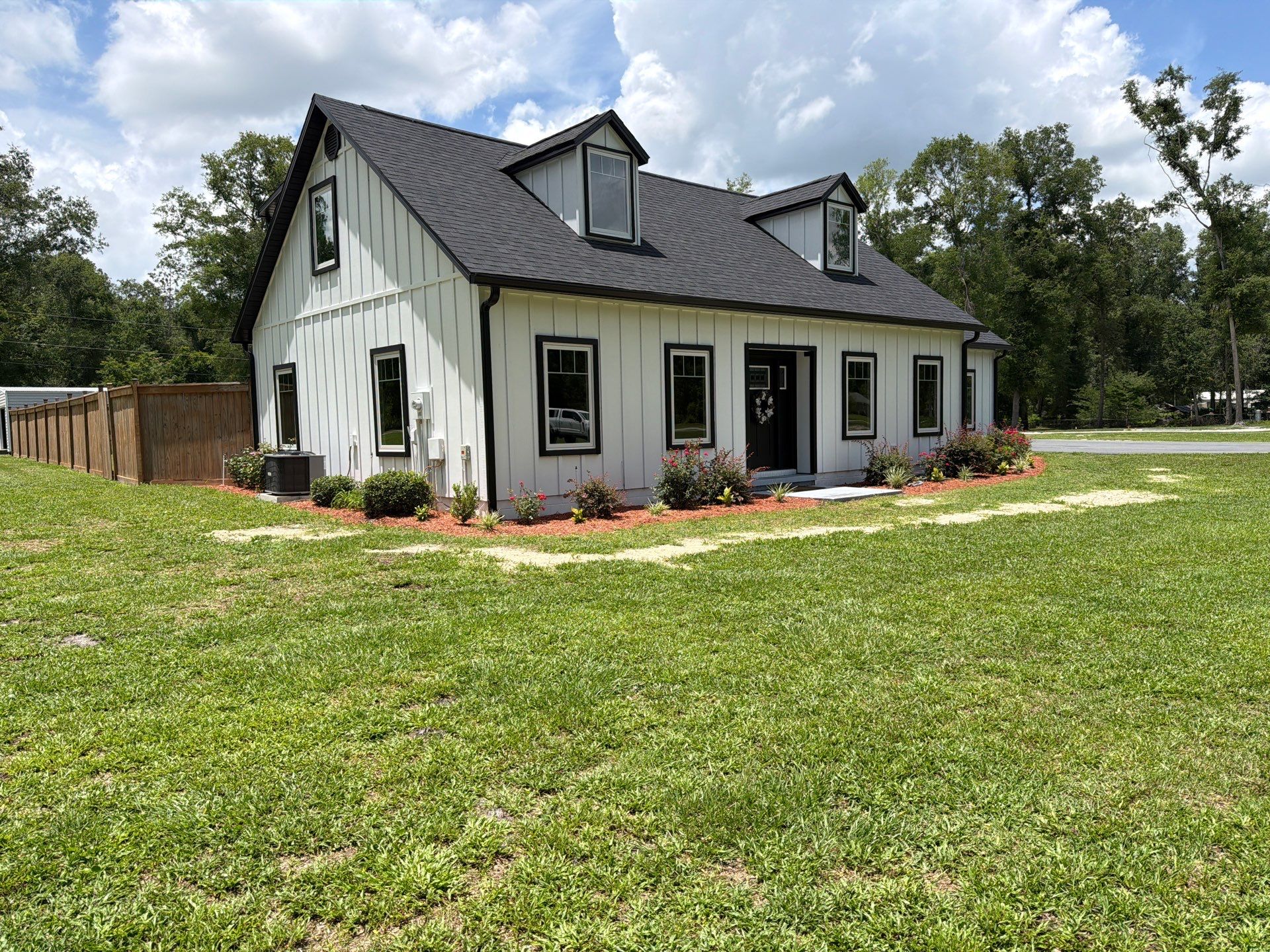 Andersen Window Installation for Modern Live Oak Farmhouse by Windows & Doors Store