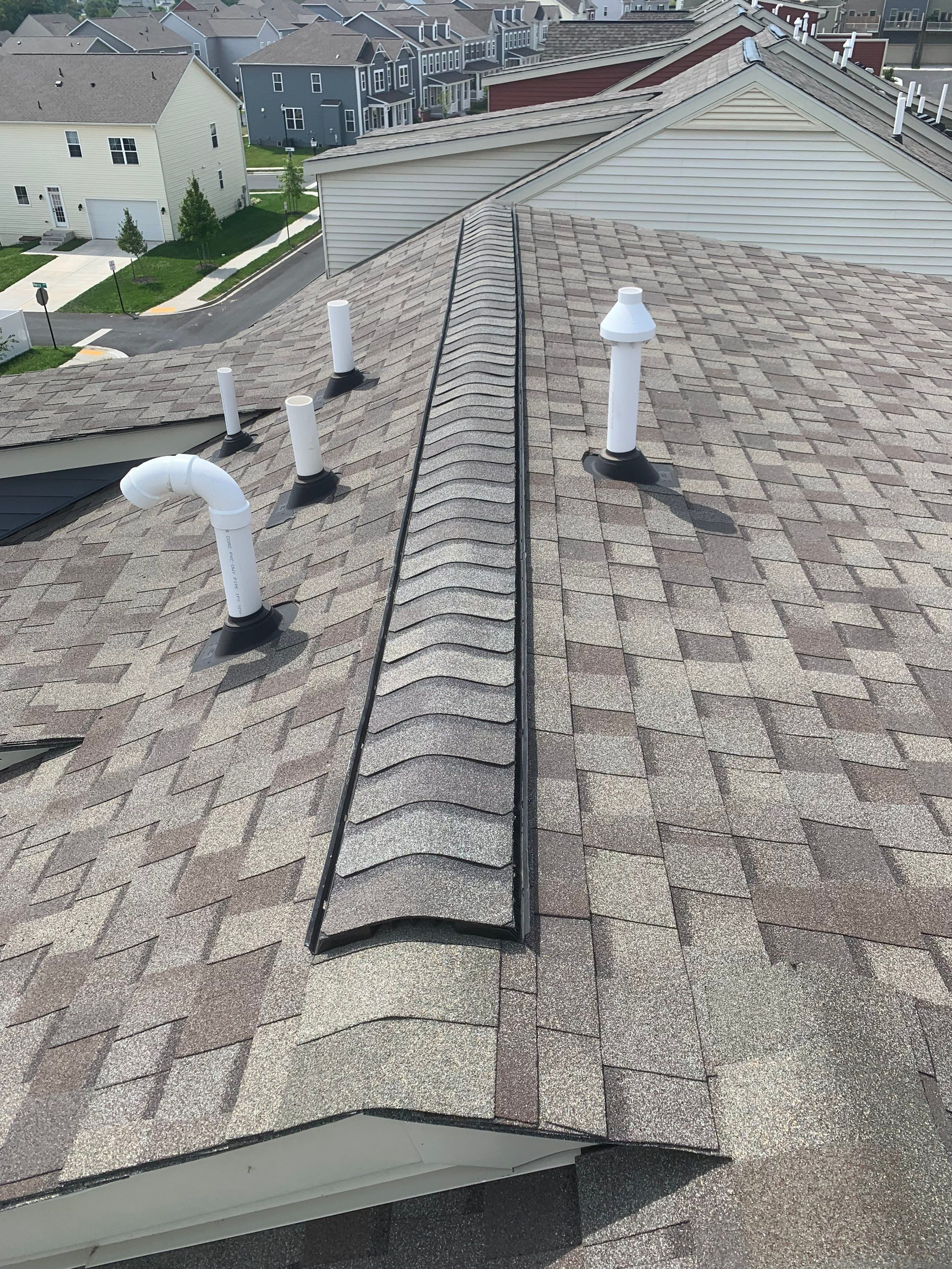 Residential Roofing Repair using Certainteed Capping and Shingle Vent II Ridge vent by Frederick Roof Repair
