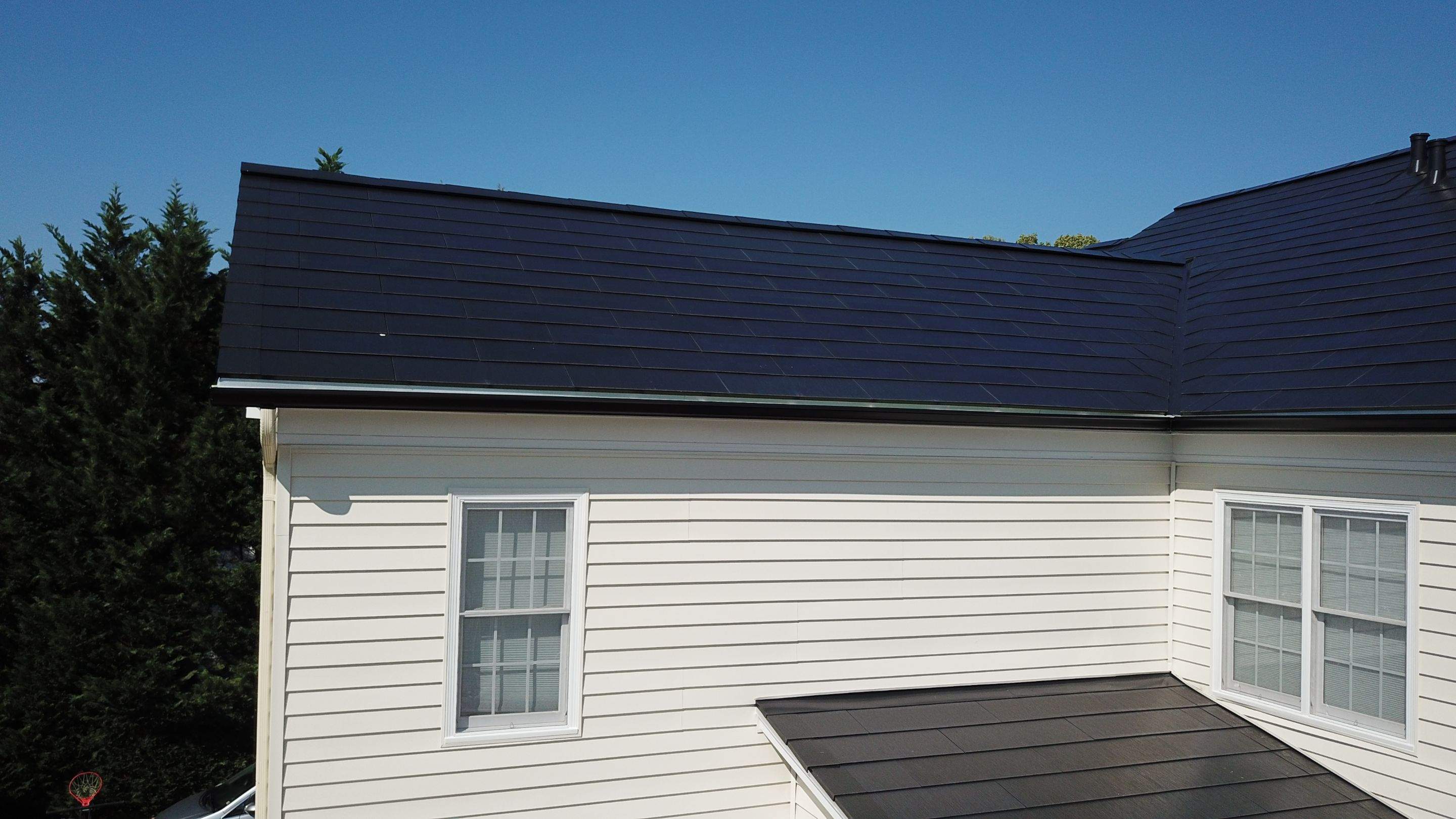 Tesla Solar Roof Replacement using Tesla Solar Roof V3 tiles by American Home Contractors