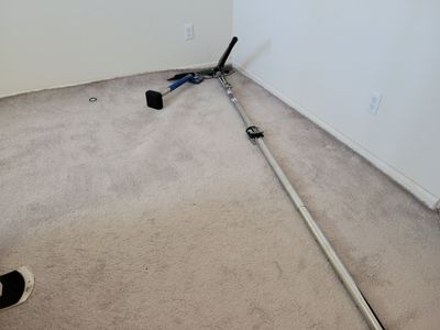 Re-Stretch and Cleaning of a Buckled Carpet