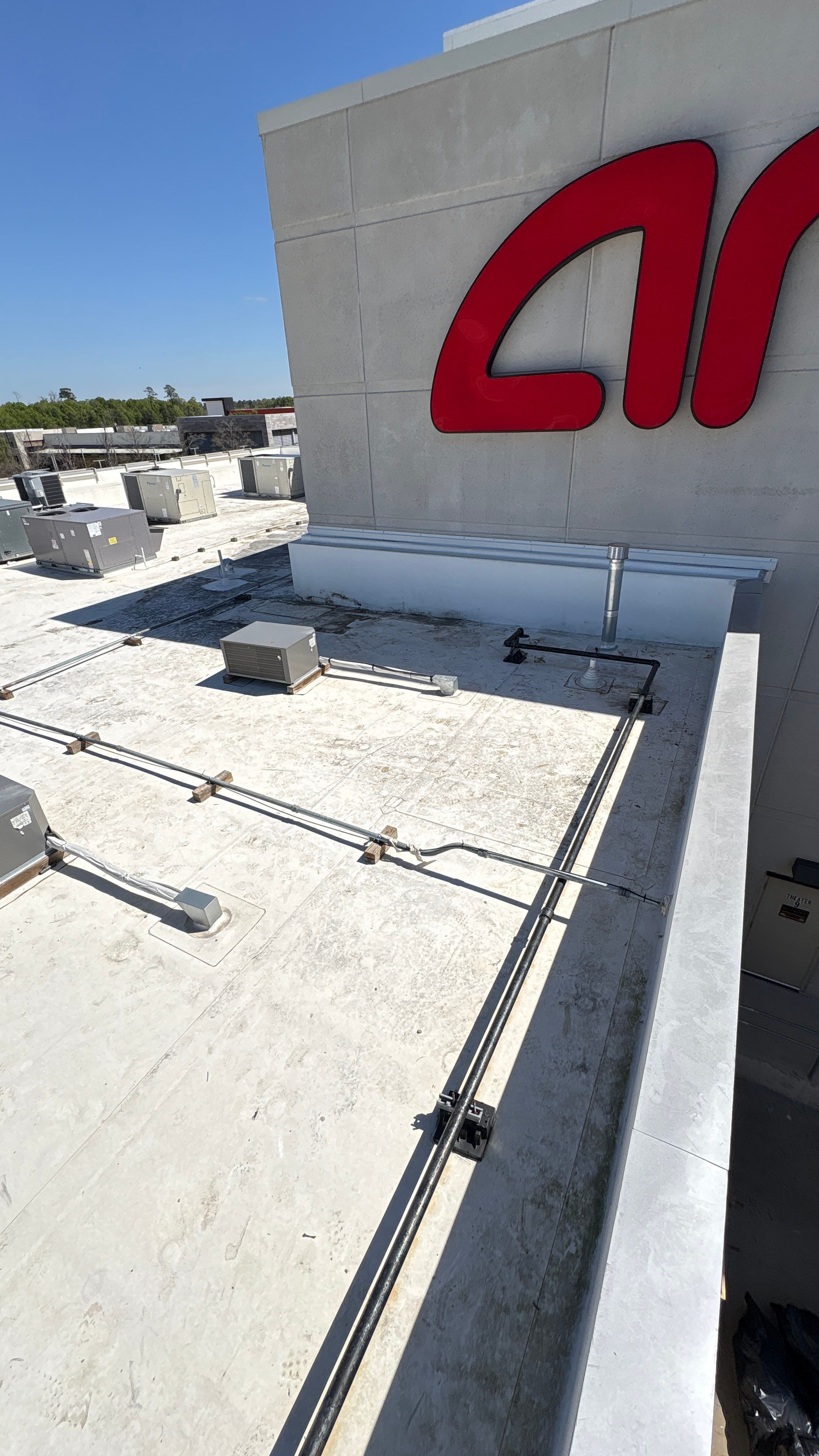 AMC Theater - Woodlands, TX by Hartland Roofing & Construction