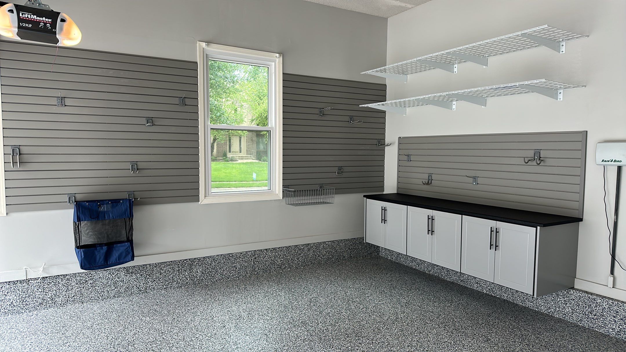 Julie H. upgraded her garage with our cabinets and wall storage options  by Banner Garage