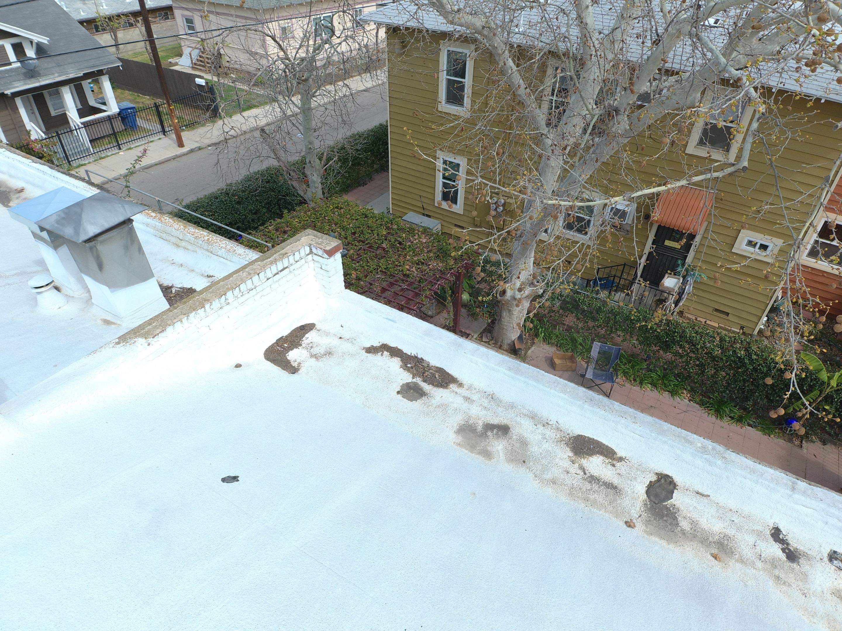 Polyurethane foam roof refurbish and recoating by Straight Edge Roofing Inc