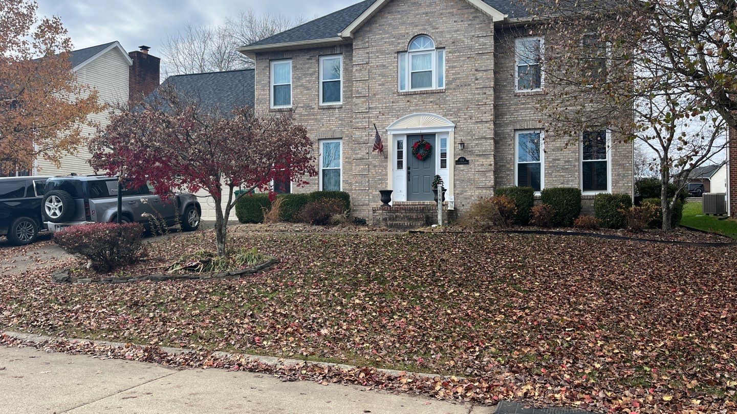 Leaf clean up using Leaf vaccum  by GrassBusters, Inc.