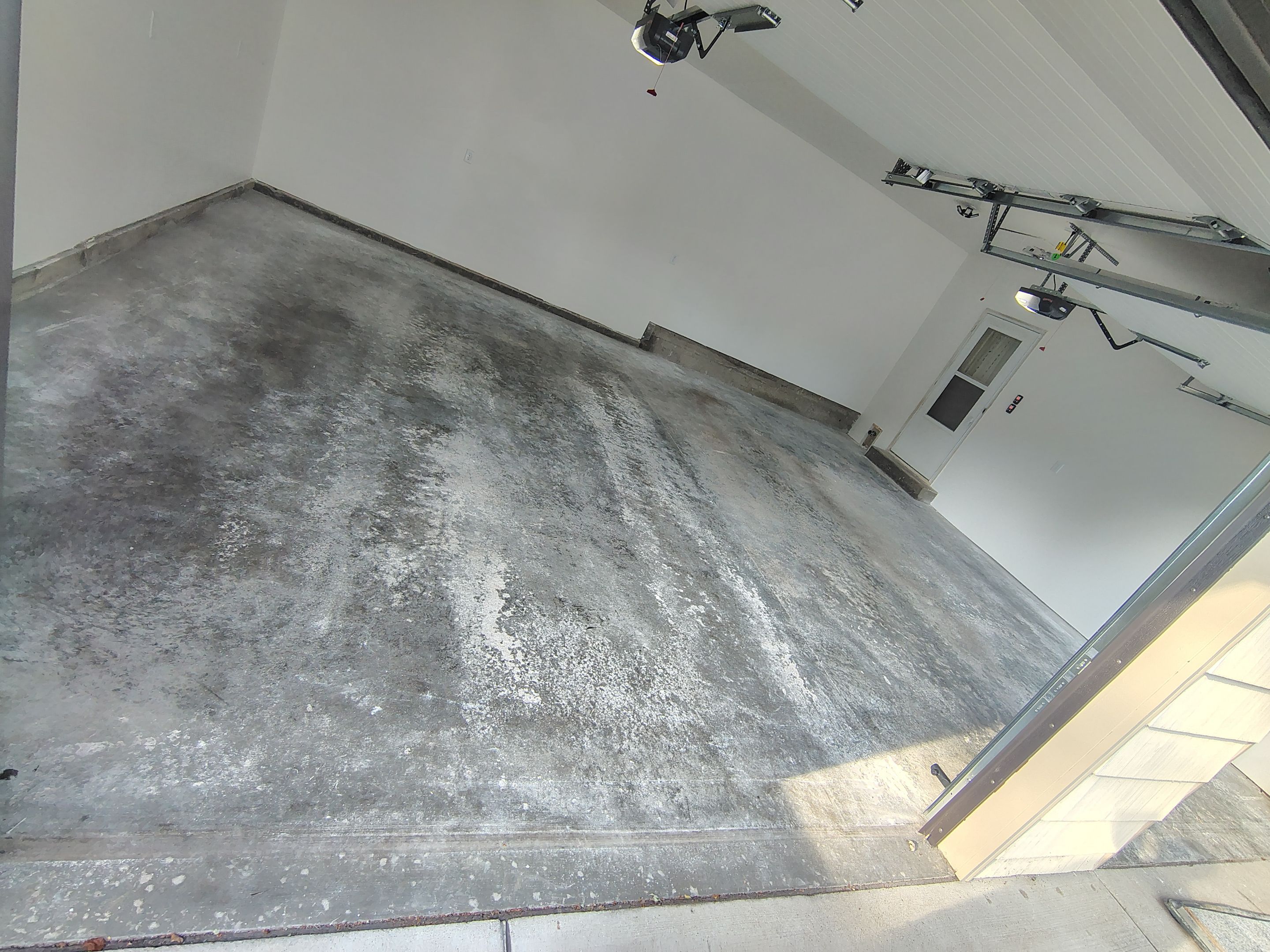 Epoxy Concrete Coating and Garage Floor Restoration in Sioux Falls by Select Painting, Coatings & Garage Cabinets