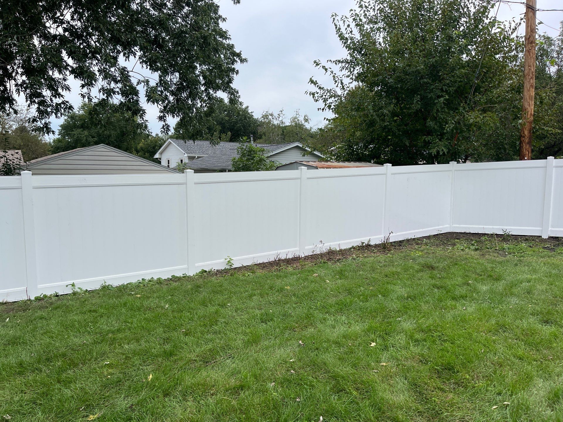 New White Vinyl Privacy Fence and Gate Installation in Waterloo by Perfect Picket Fence and Stain