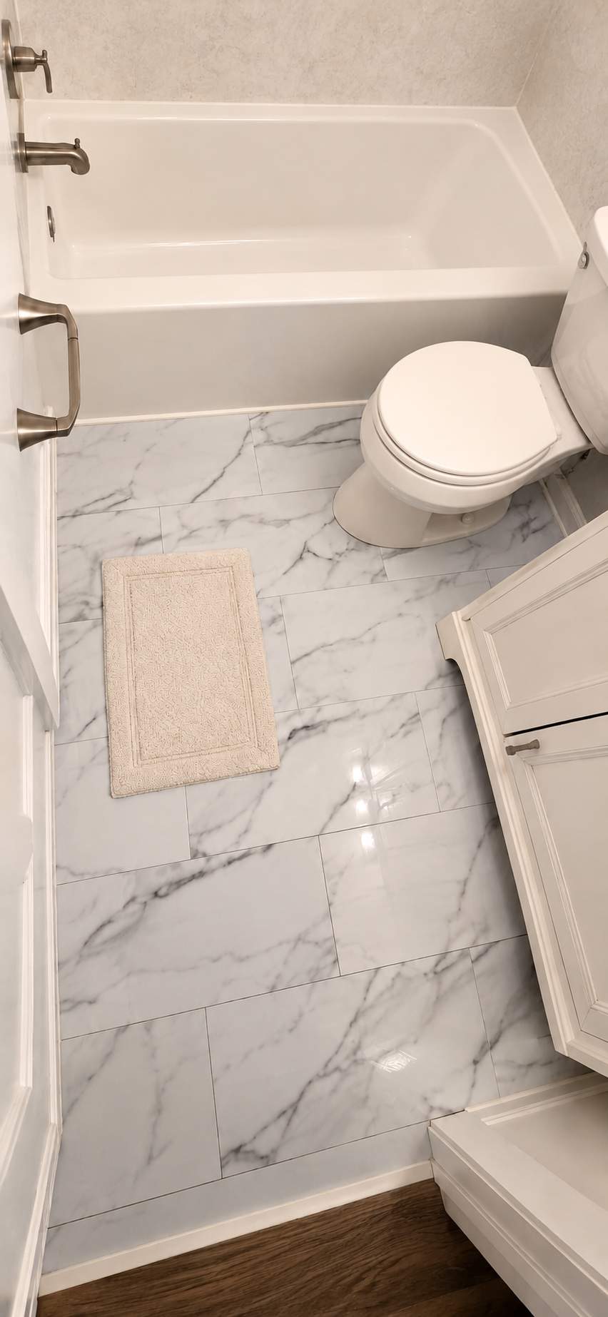 Bright Marble-Inspired Bathroom Remodel - Beltsville, MD by Remodel Now