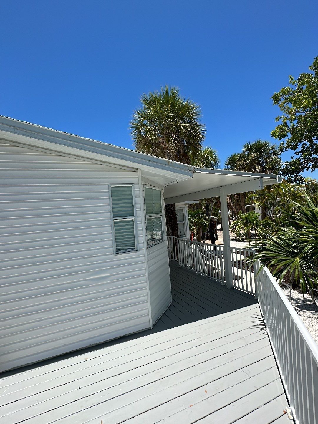 Downspout Installation using Charcoal Grey in Sanibel FL by Gutter Professors