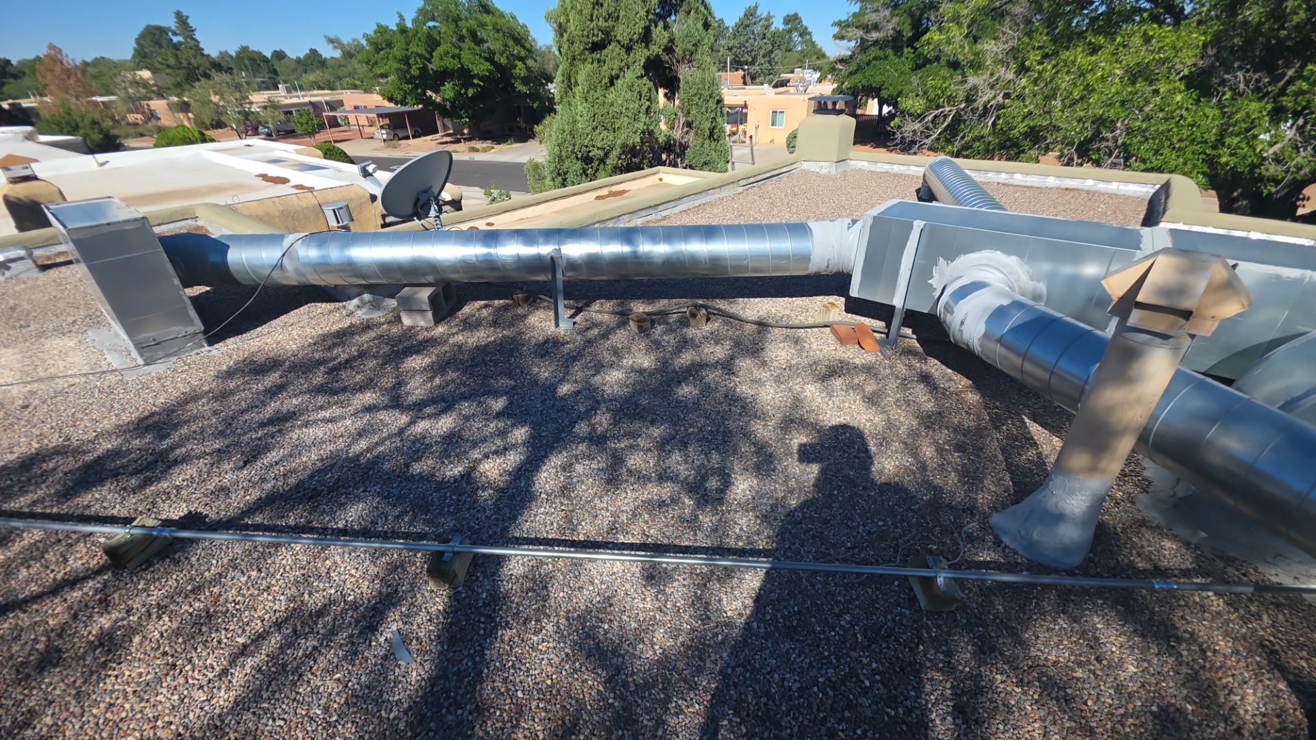 Tar and Gravel Roof Maintenance and Penetration Sealing in Albuquerque by Doyle Roof Masters Inc