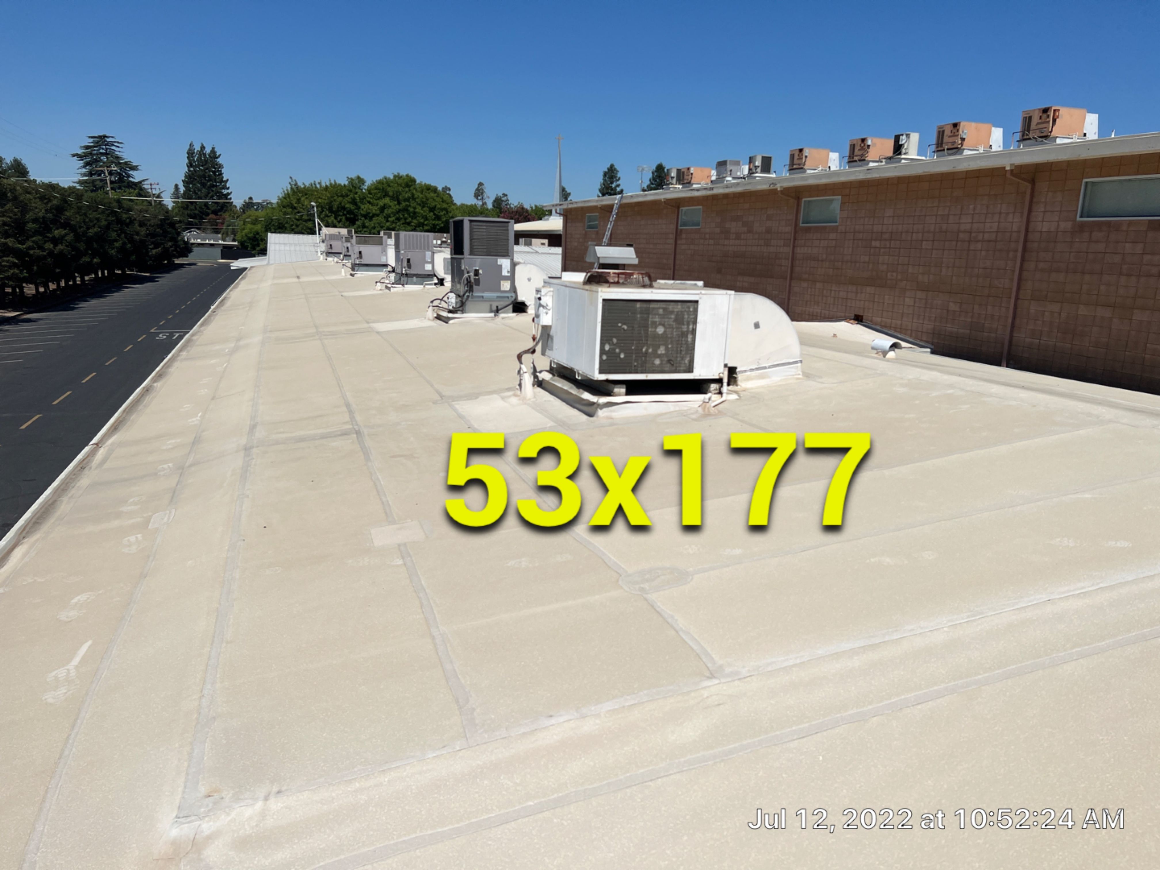 MR Roofing system using Benchmark/PUMA XL coatings over TPO single-ply roofing by Straight Edge Roofing Inc