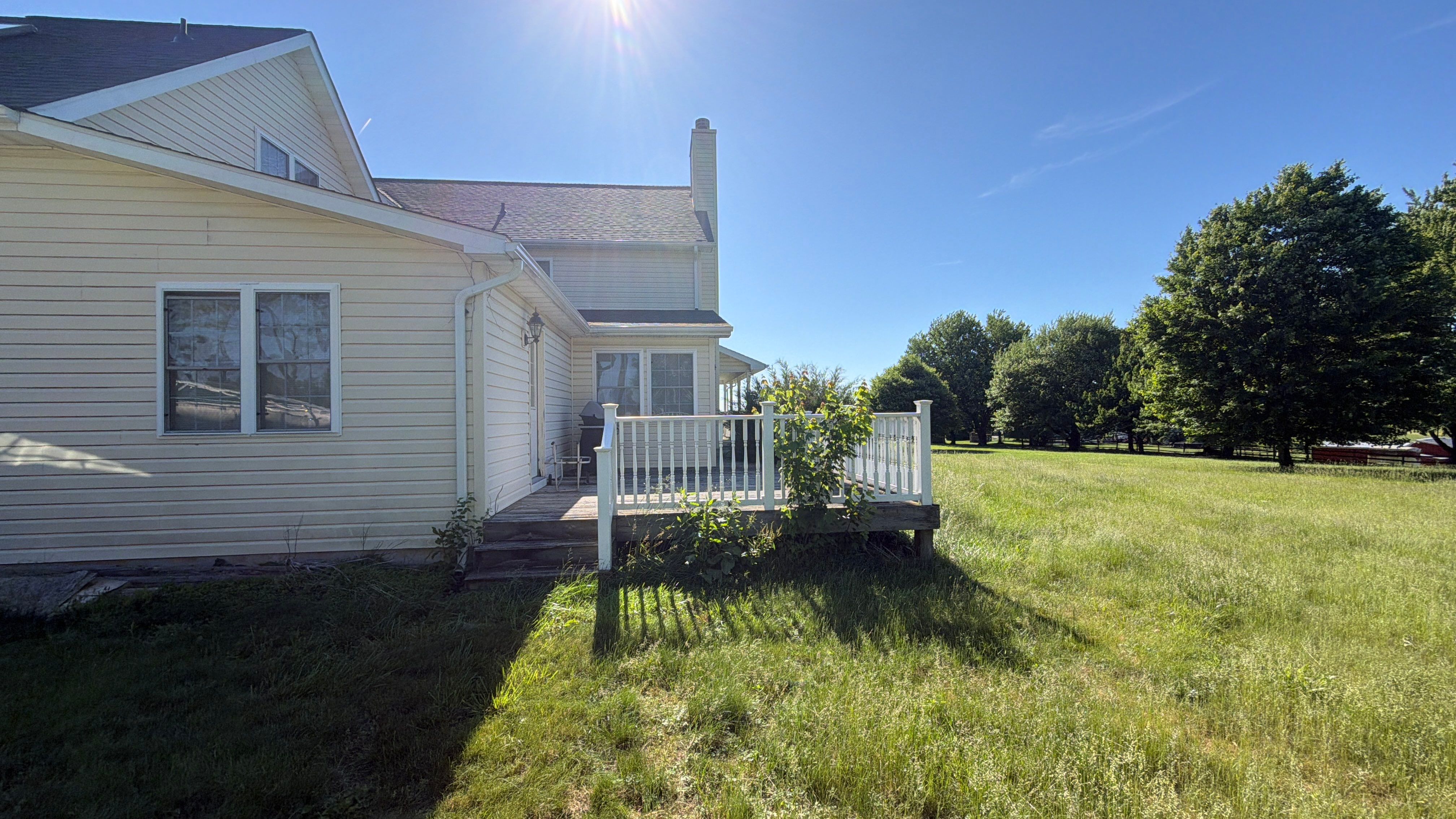 Vinyl Siding House Washing and Wood Deck Restoration in Carroll County by Baltimore Pressure Washers Inc.