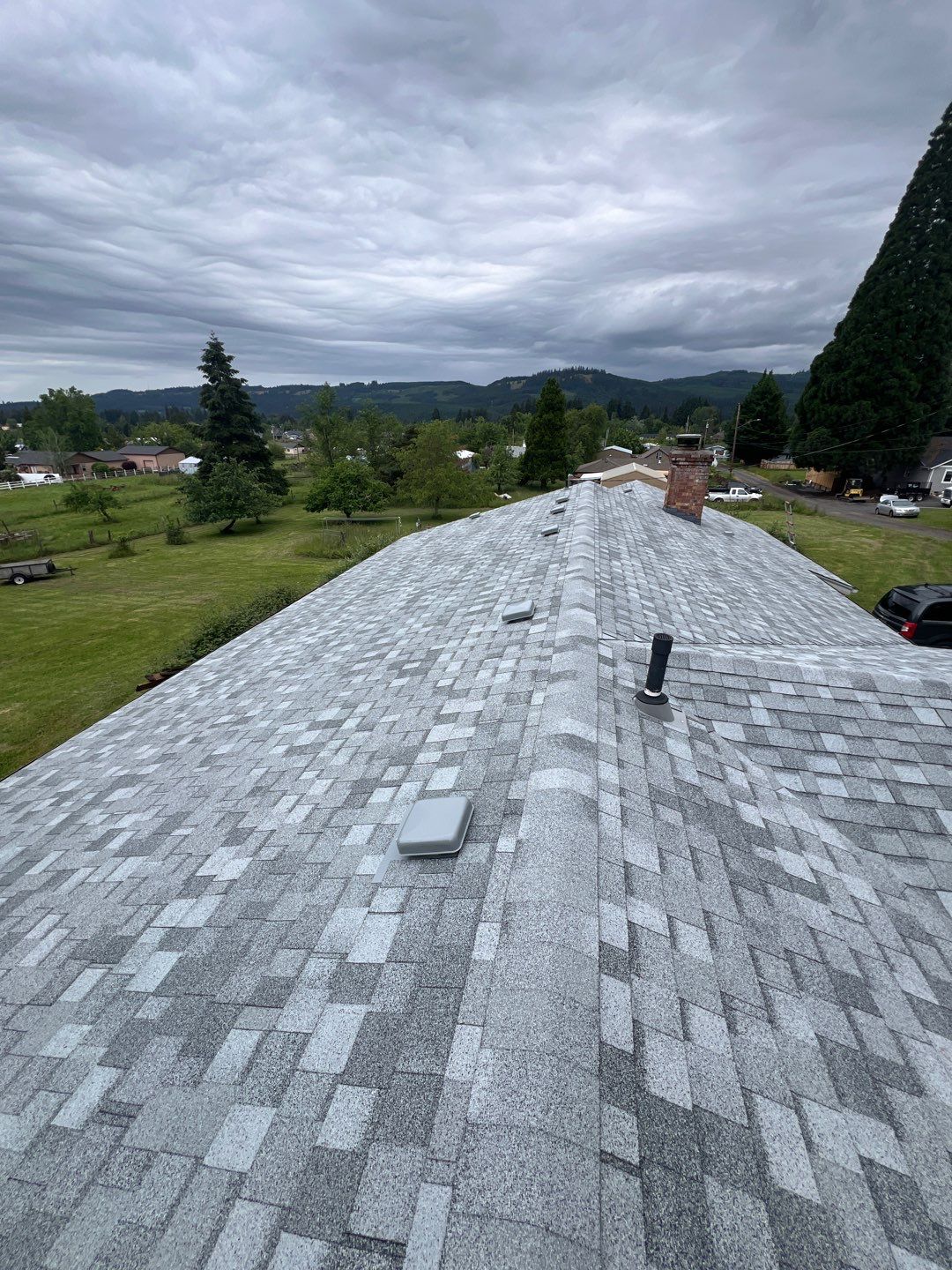 Residential Roofing Installation using IKO Dynasty (Color: Frostone Grey) by Orezona Building & Roofing Company, Inc.