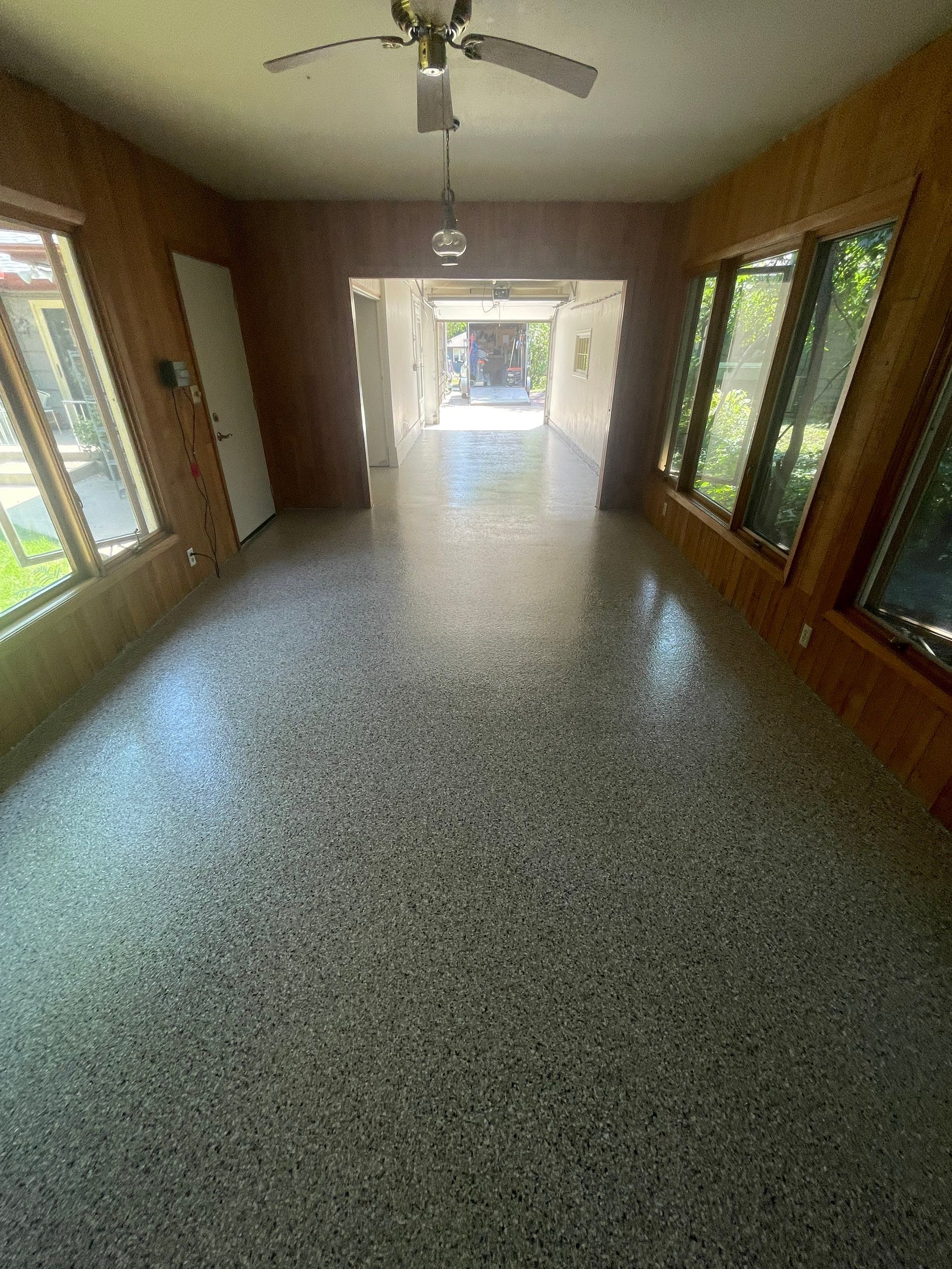 Sioux Falls Garage and Sunroom Concrete Coating with Coyote Flake by Select Painting, Coatings & Garage Cabinets
