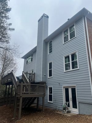 Chimney Siding Reconstruction and Full Exterior Painting in Marietta