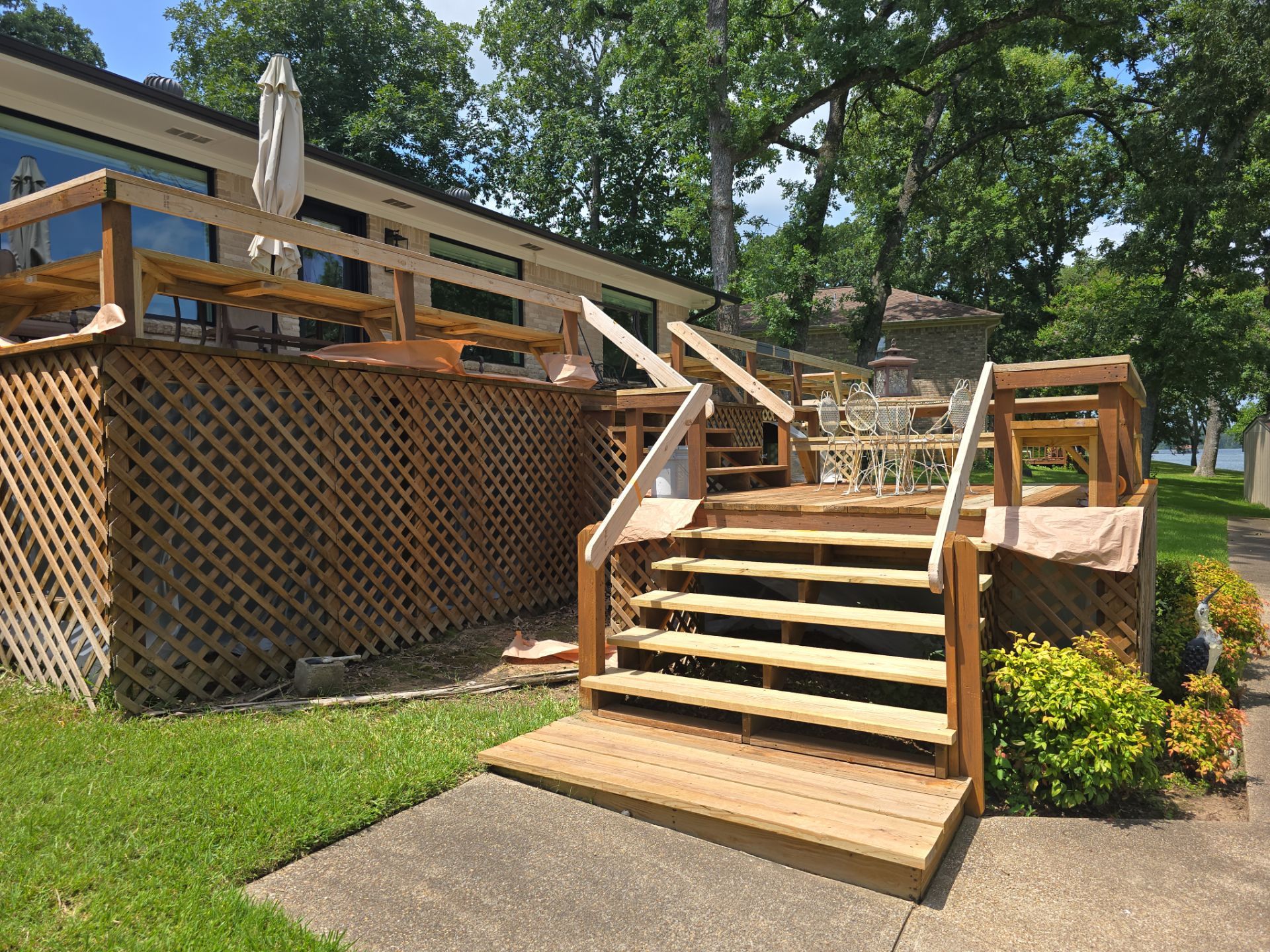 Lake House Deck Restaining in Flint, Texas by Quality Coats Painting