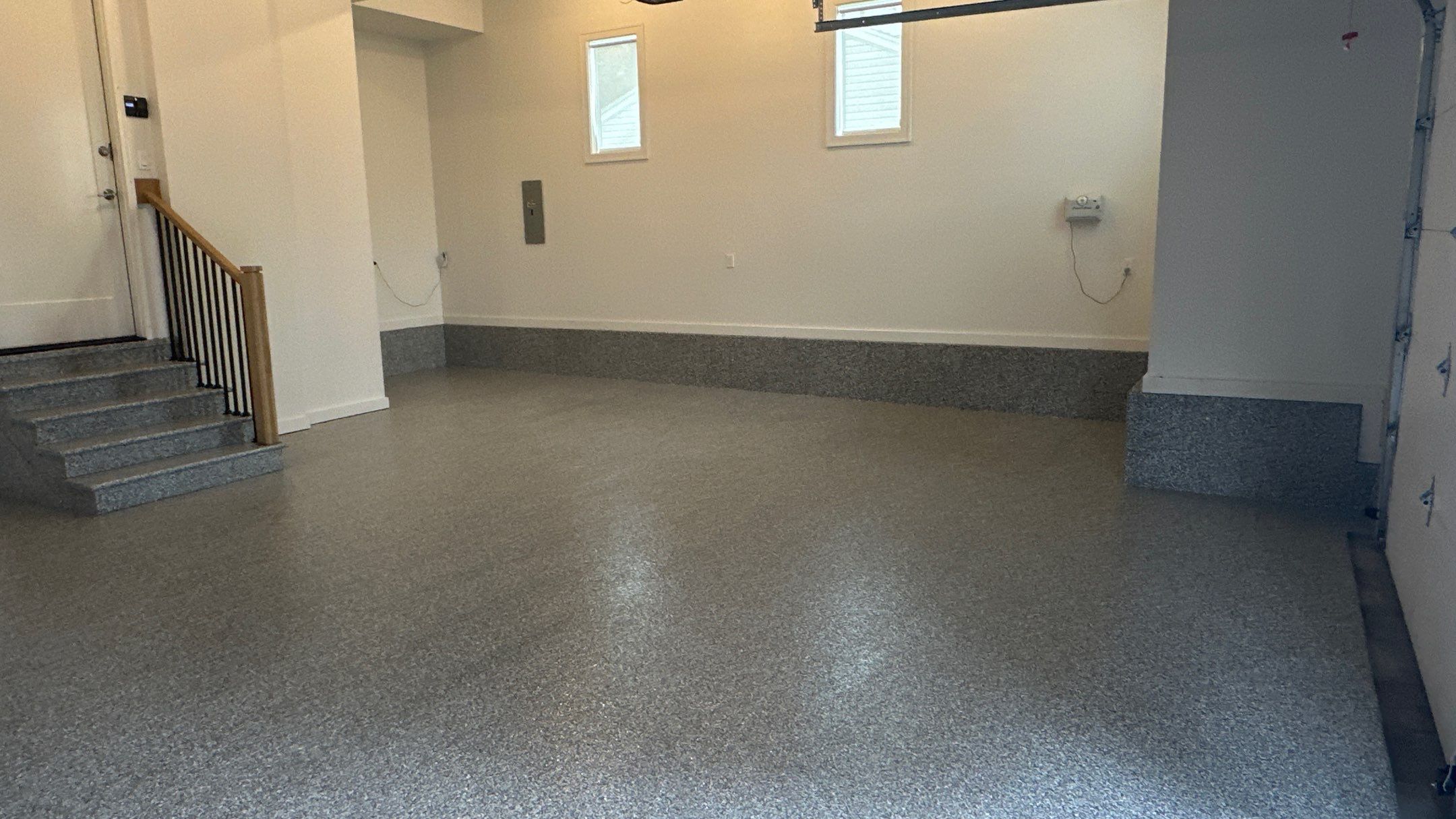 Max R. upgraded his garage with overhead racks and a New floor  by Banner Garage