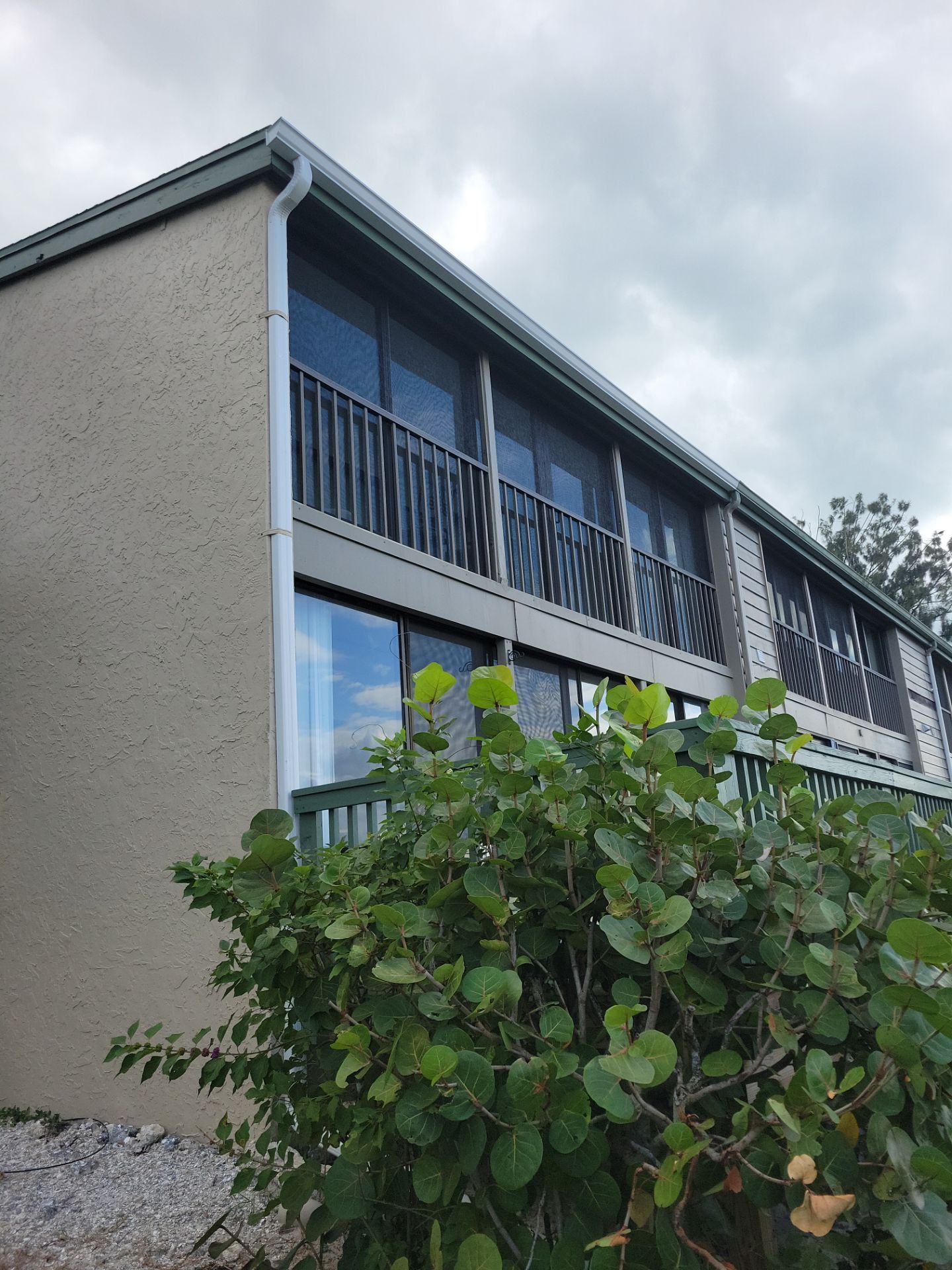 White Gutters Repair and Installation in Sarasota FL by Gutter Professors