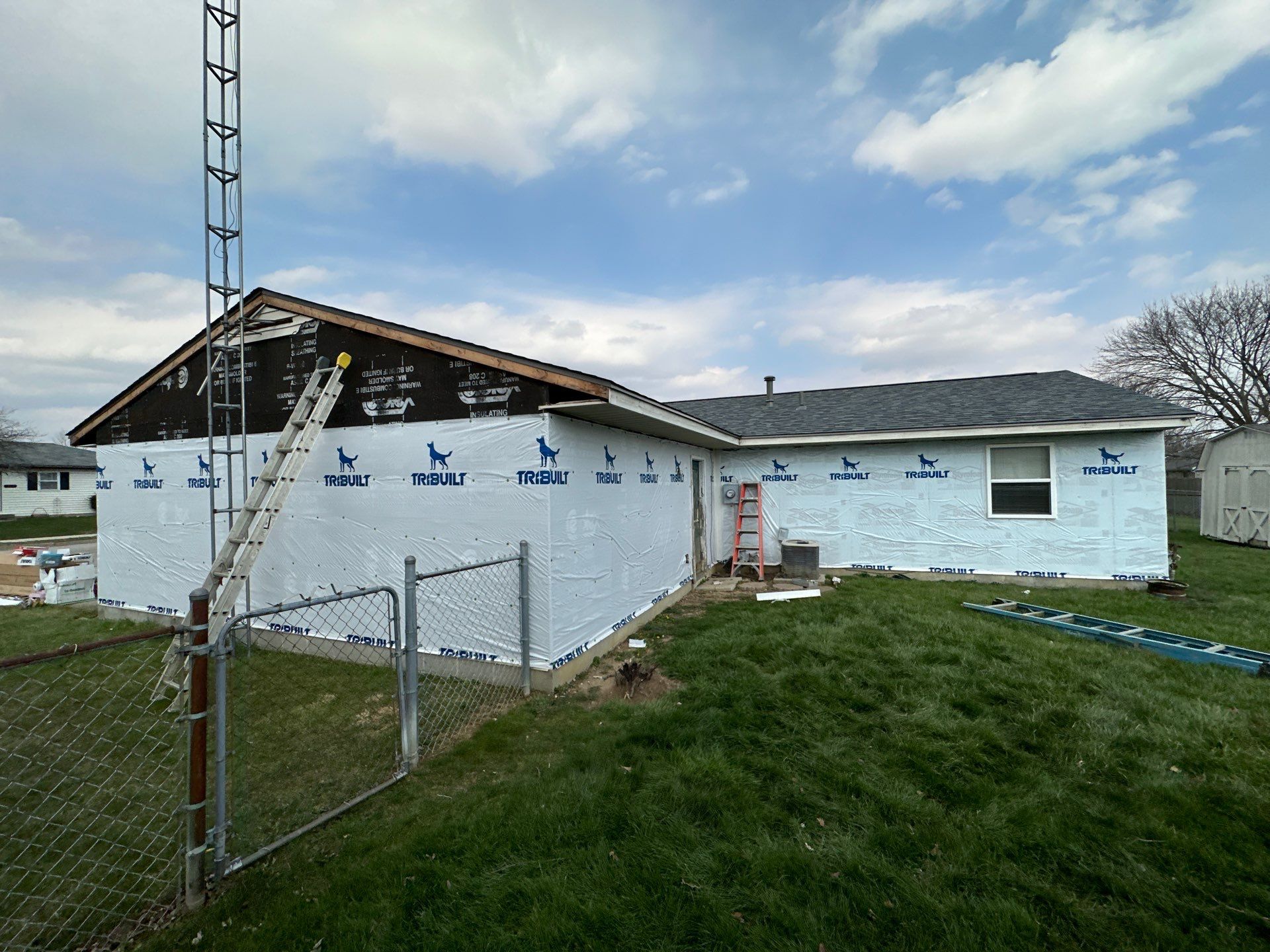 Storm Damage Residential Roof and Siding Installation by WIW Enterprises Inc