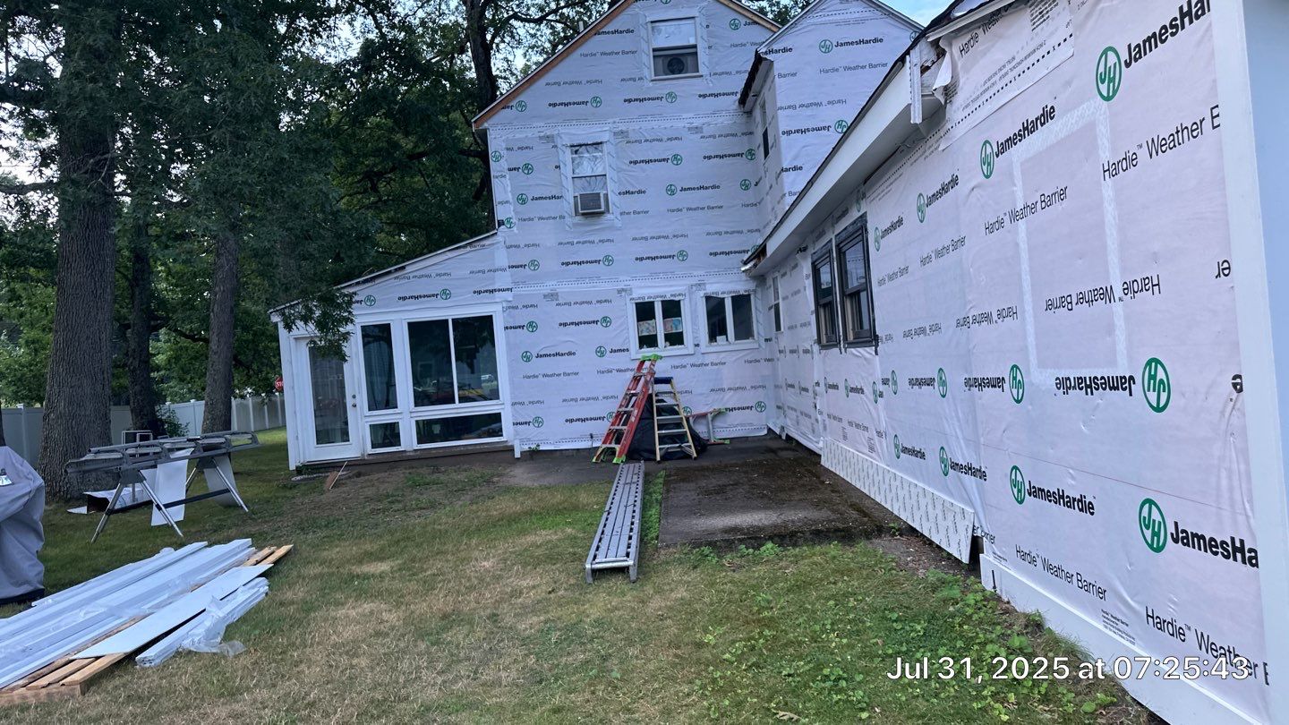 James Hardie Lap Siding Installation in Chelmsford, MA by Mighty Dog Roofing of Greater Middlesex County
