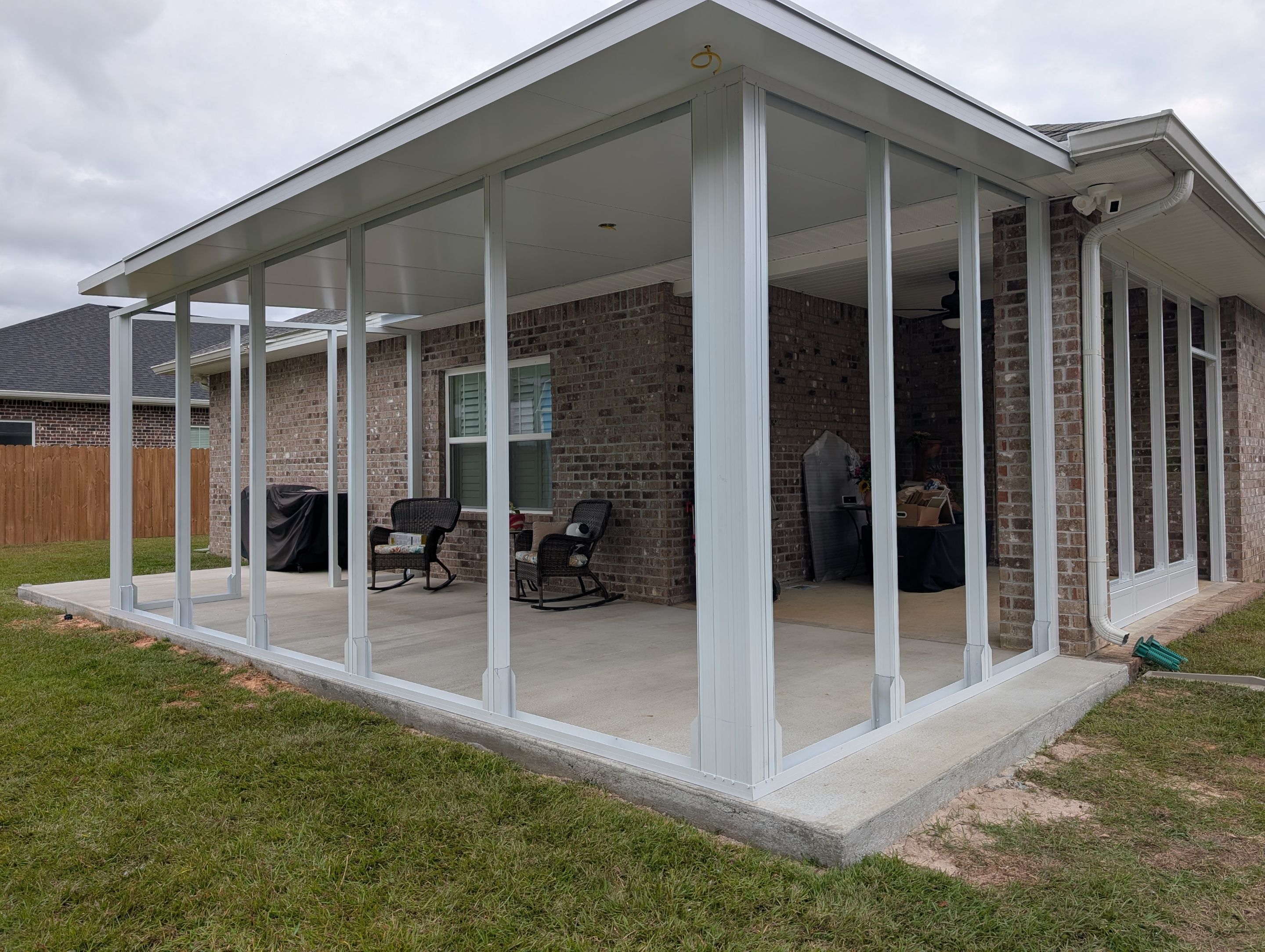 Home addition w/Vinyl 4-Track Windows by Titan Sunrooms