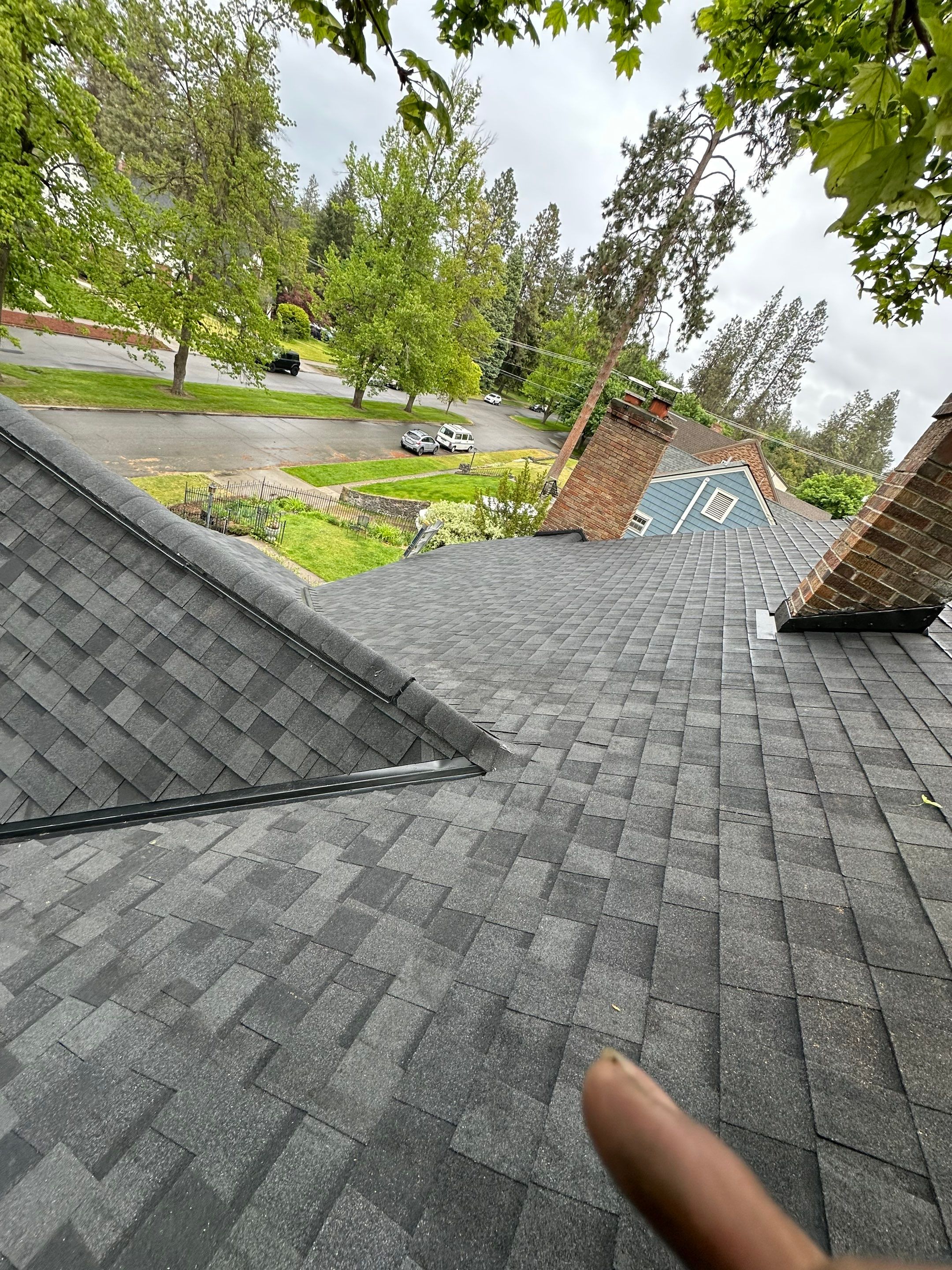 Alpine Roofing project on West 21st Avenue featuring CertainTeed Landmark PRO Moire Black shingles