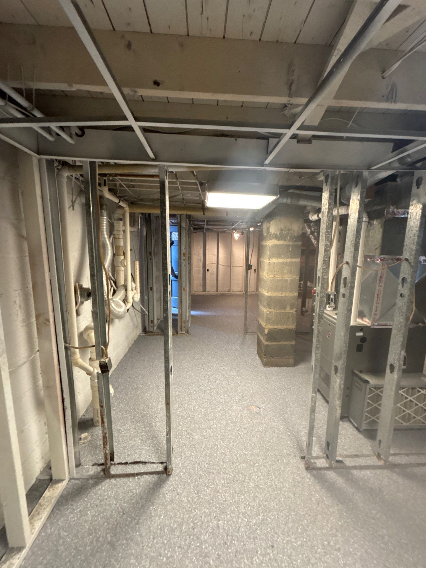 Basement Concrete Floor Coating with Penntek Flake System by Spectrum Painting, LLC