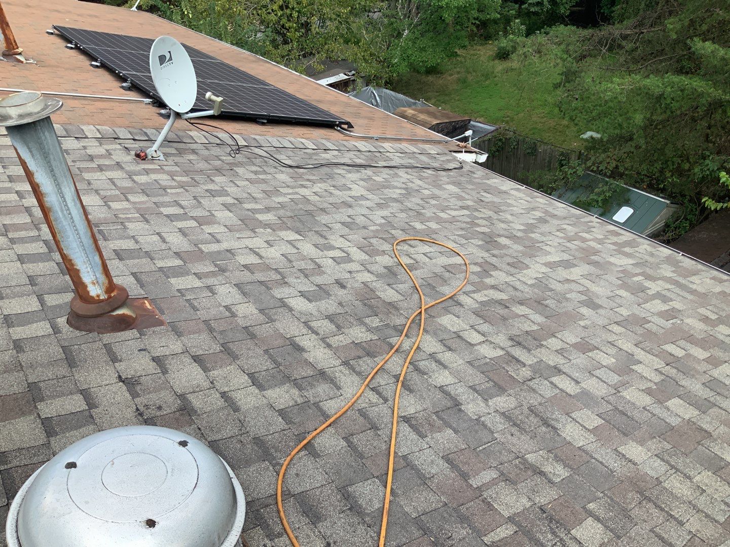 Residential Roofing Installation using Landmark Shingles Color Weatherwood by Alpha Design Services
