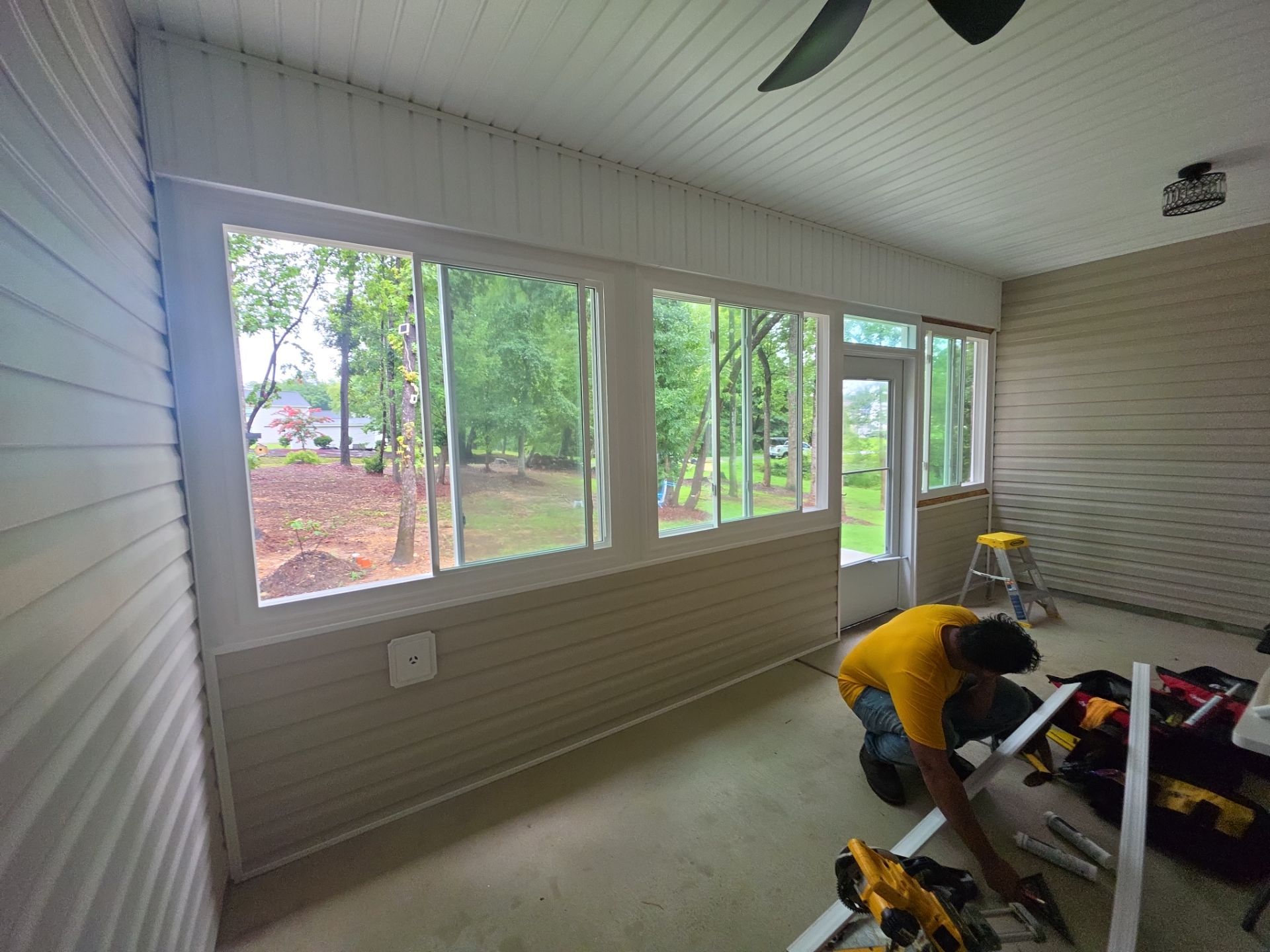 Custom Screen Porch and Concrete Patio Installation in Selma by The Remodeling Company