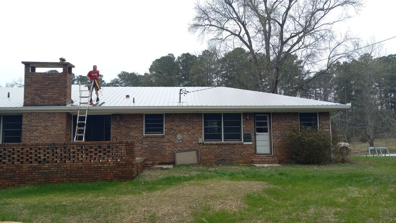 Bold Switch: From Shingles to Metal by Georgia Roof Advisors