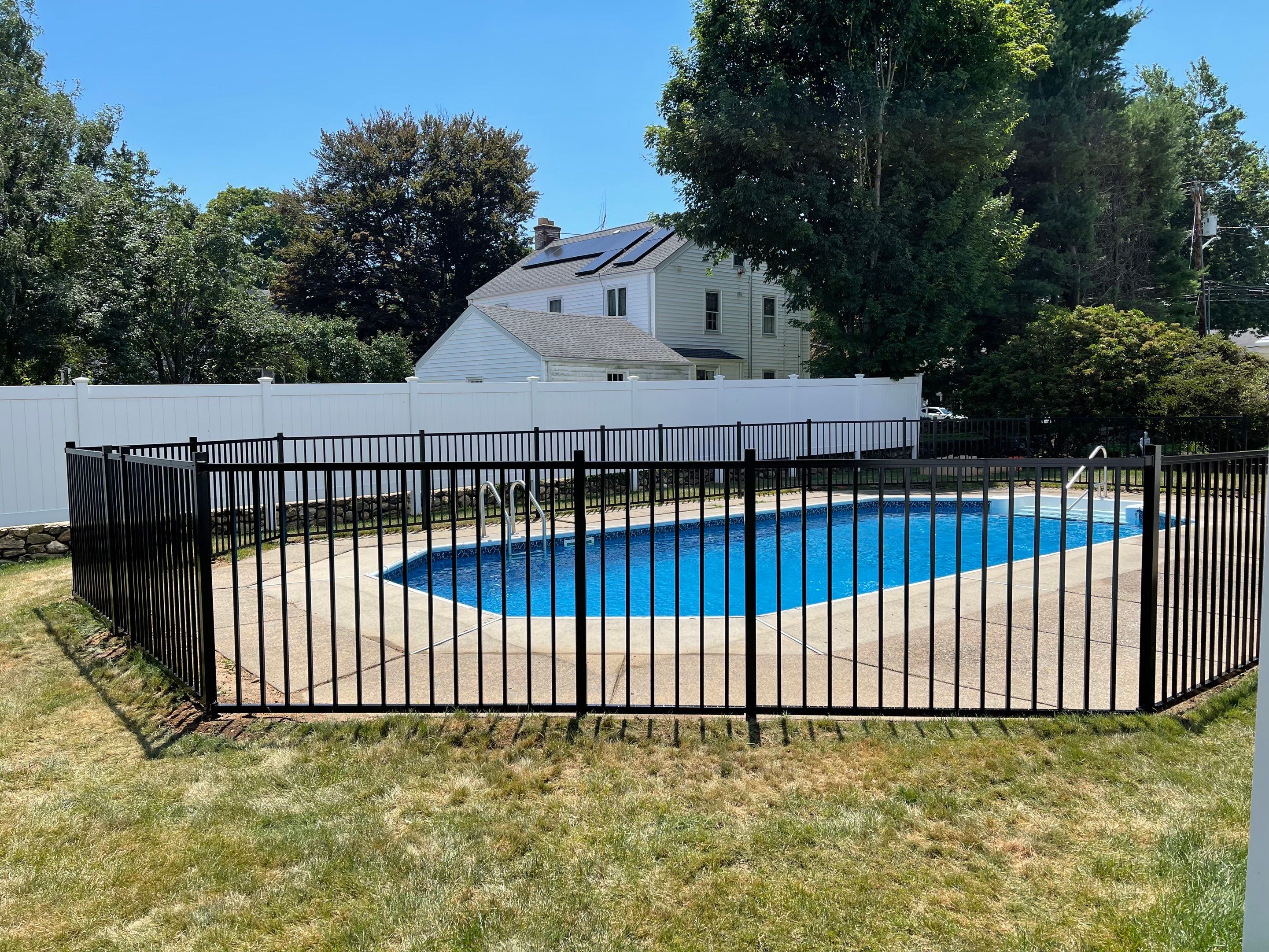 Black Aluminum Pool Fence by DiGiorgi Roofing and Siding Inc