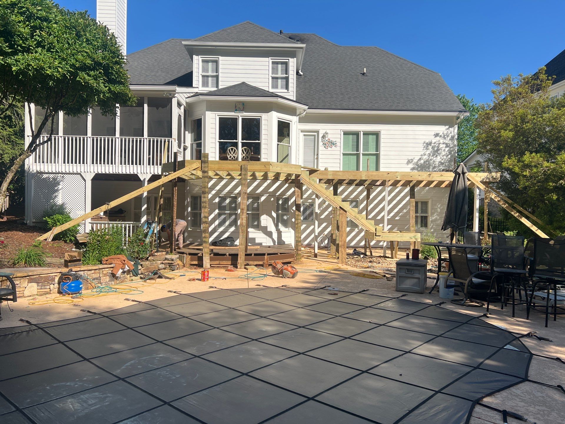 Multi-Level Pressure-Treated Wood Deck and Screened Porch in Acworth by Swift Home Renovations