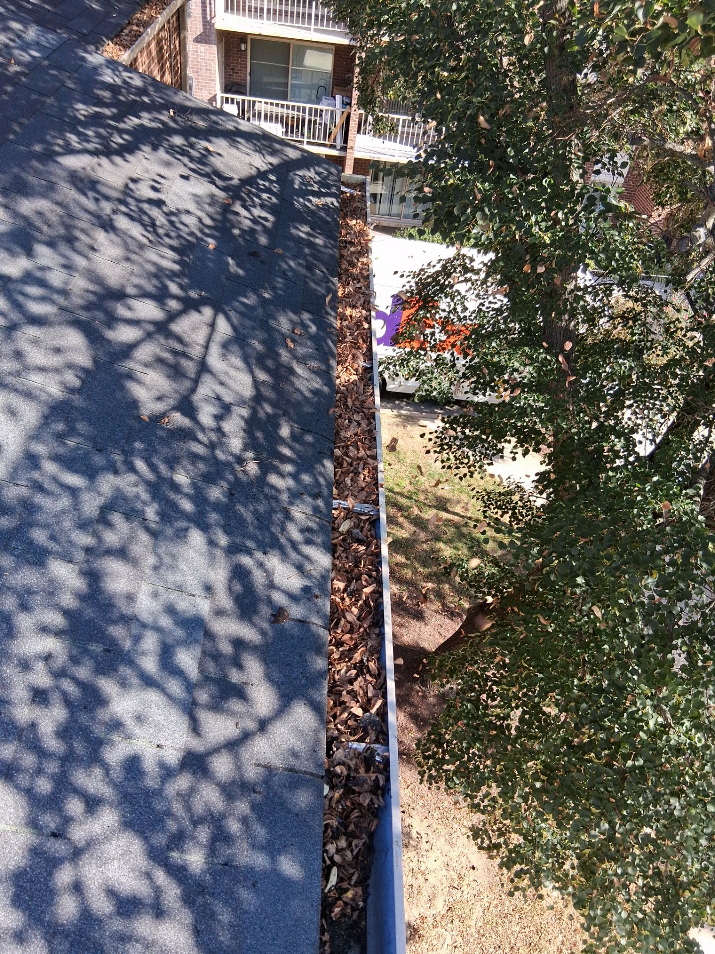 Commercial gutter cleaning Maryland before photo with filled gutters