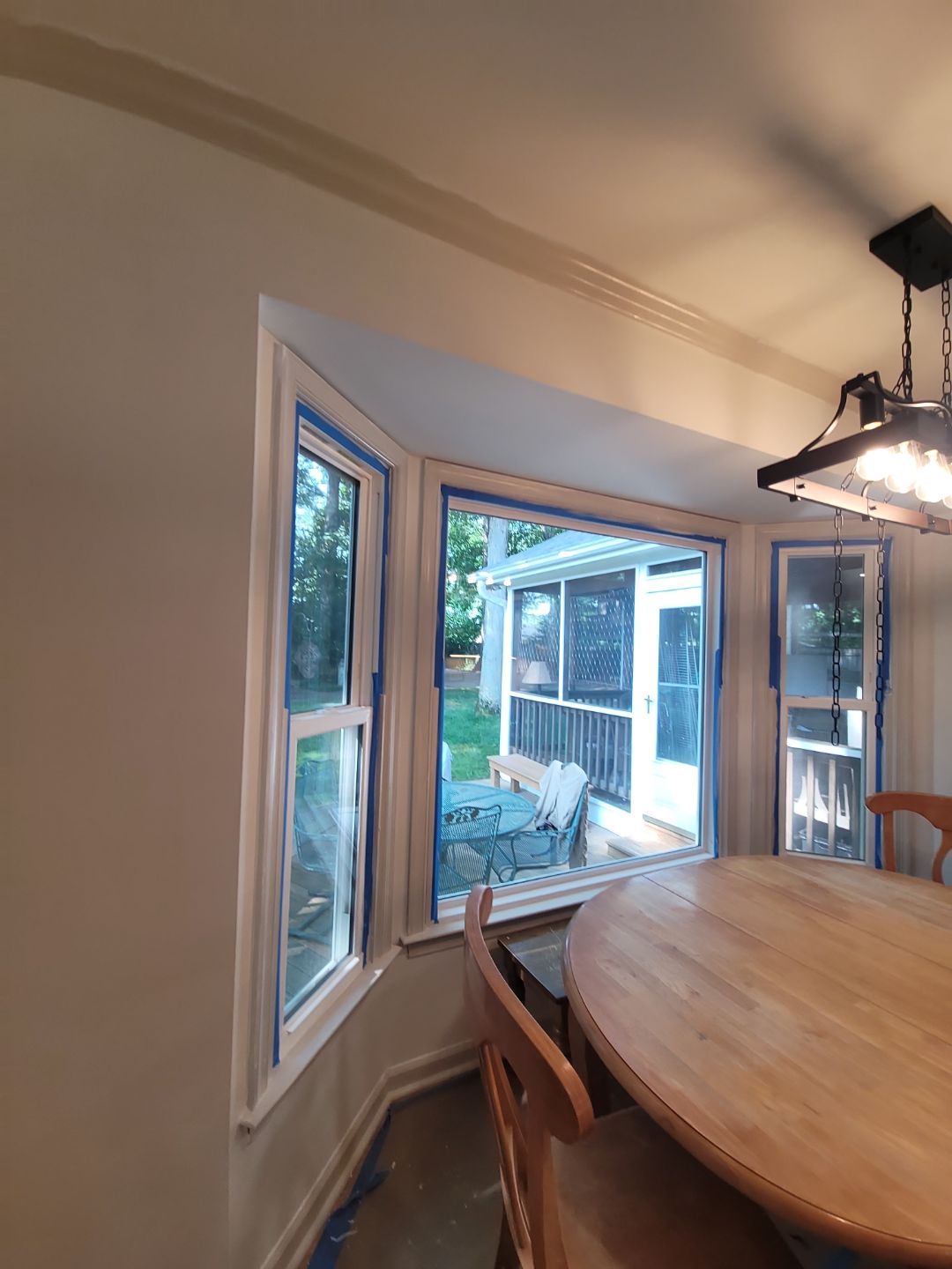 A Pathway to Personality – A Two-Tone Kitchen Transformation in Apex by Elite Remodeling and Design LLC