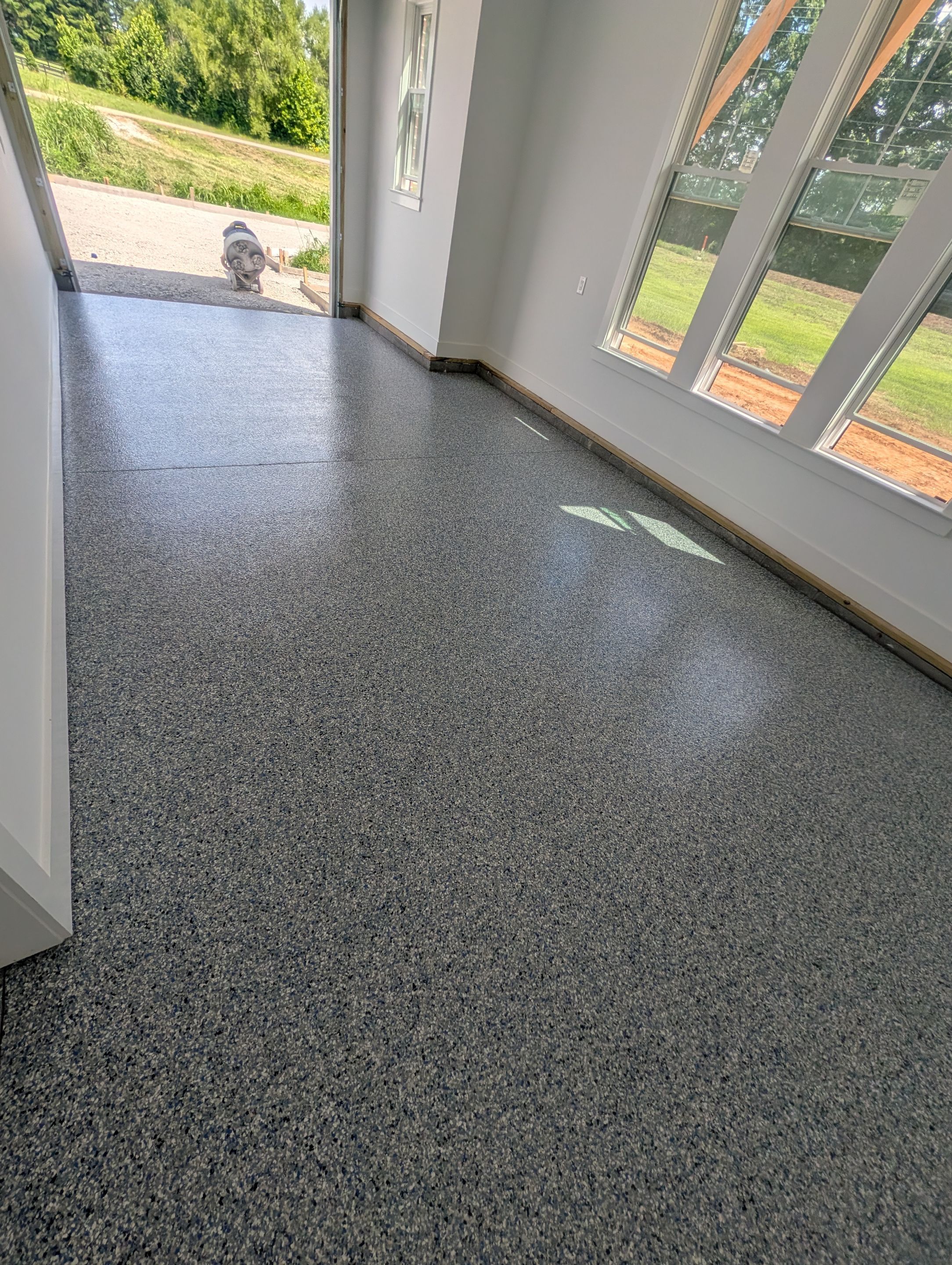 Garage Floor Coating using Comet by My Garage Floor Guys