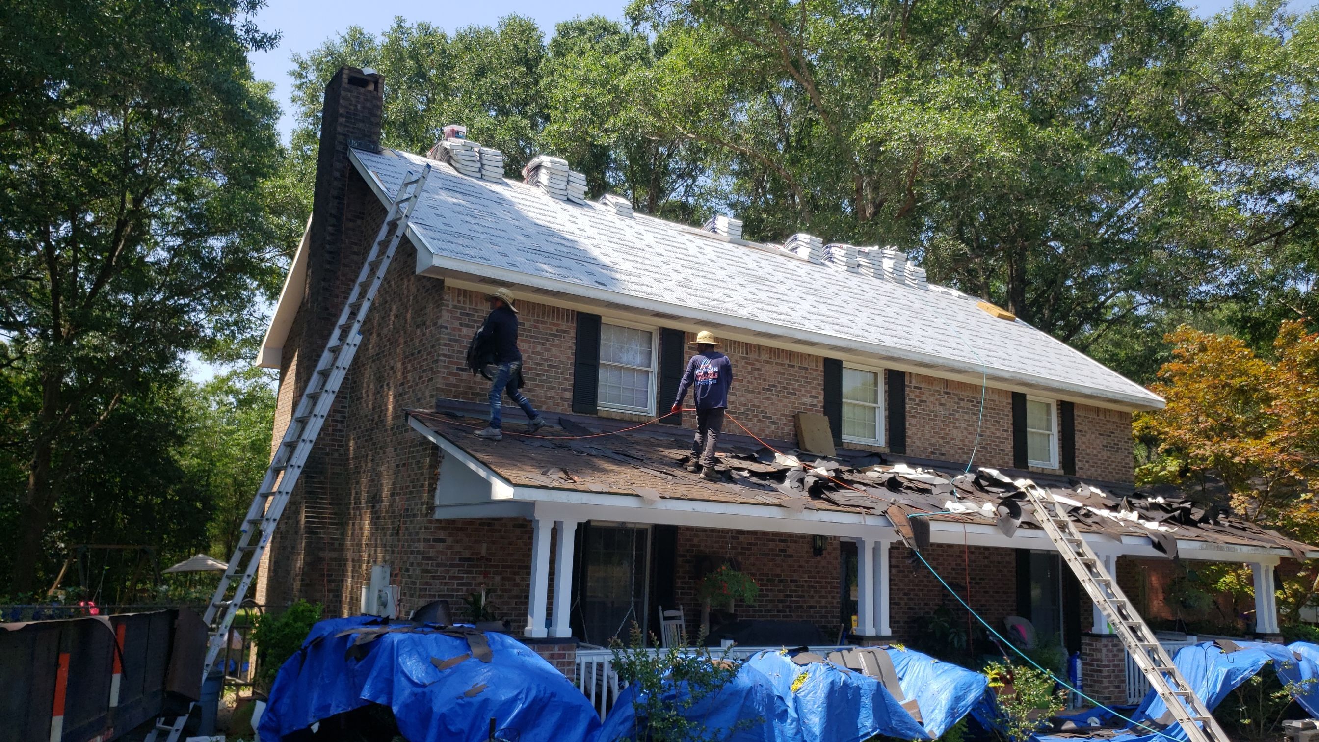 Residential Roofing Installation using Roof Replacement by American Roofing & Construction LLC
