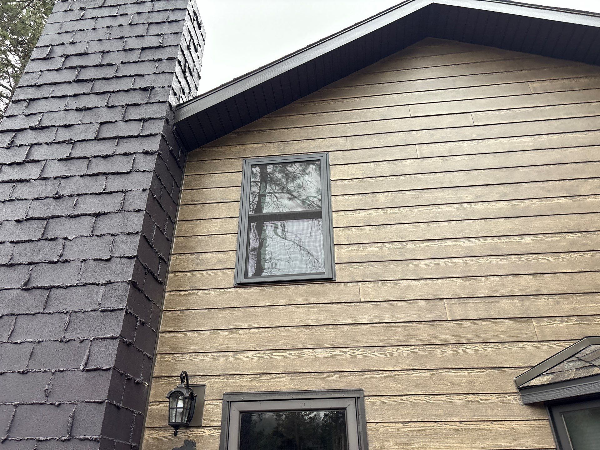 Home in the Black Hills Transformation by Superior Siding Inc