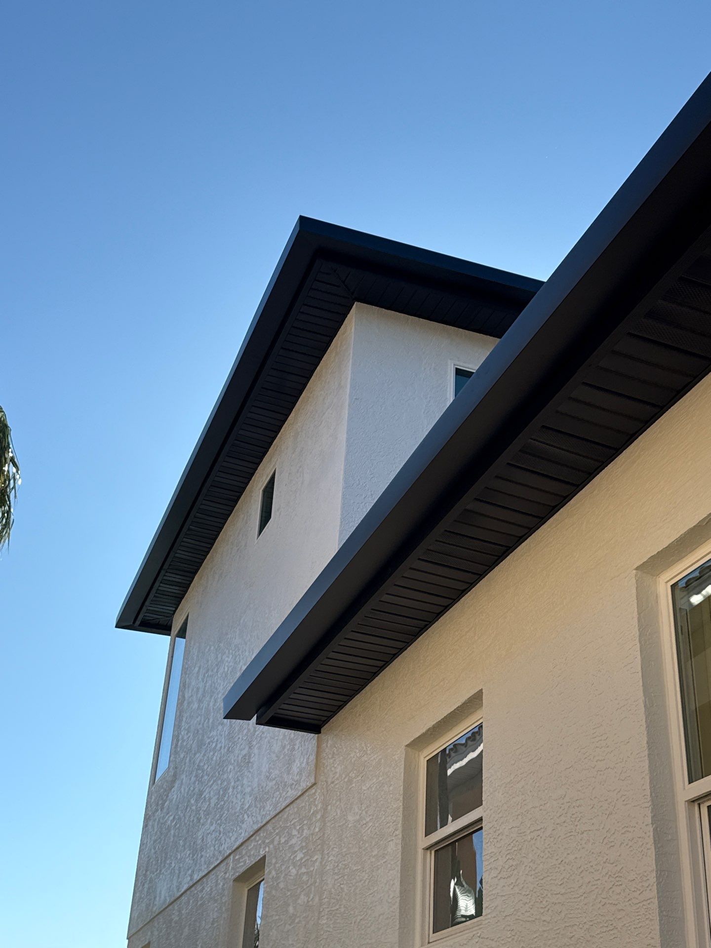 Soffit and Fascia Installation and black seamless gutters in Sarasota FL by Gutter Professors