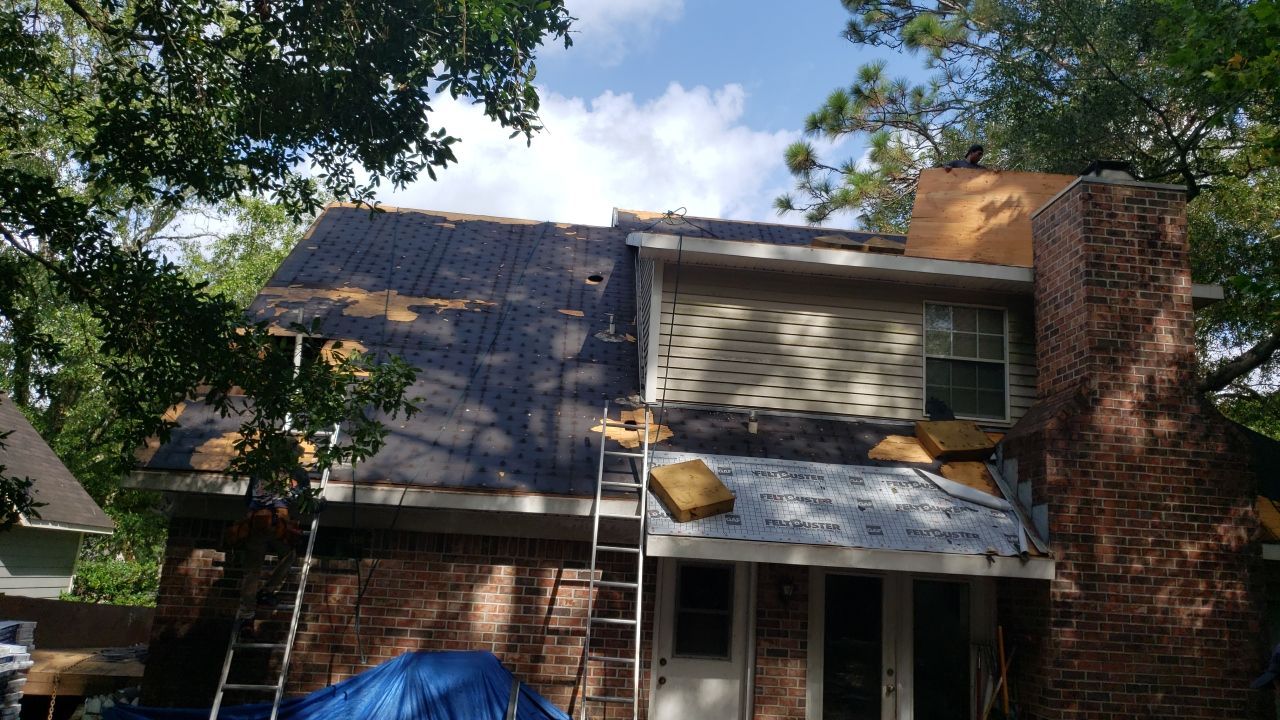 Residential Roofing Installation using Roof Replacement by American Roofing & Construction LLC